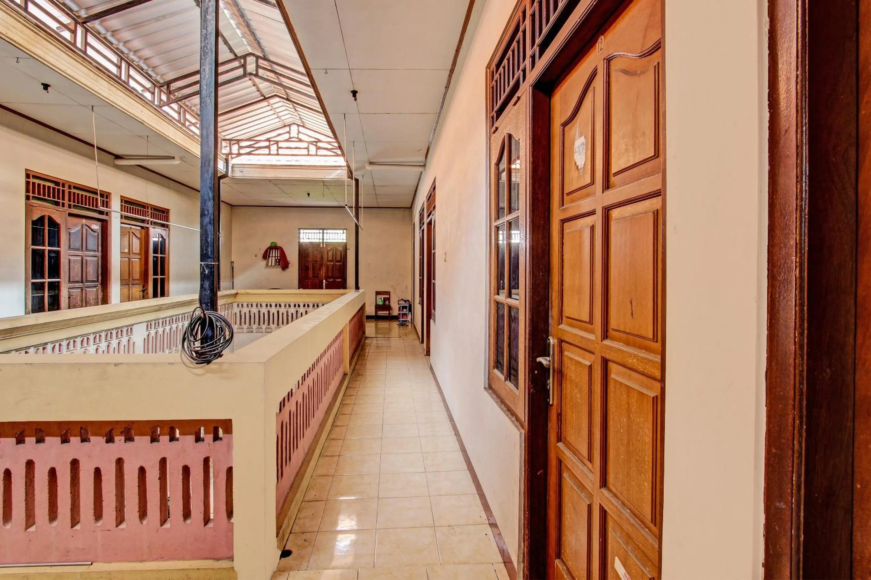 Lobby or reception in Hotel O Puri Kasih Guest House Syariah