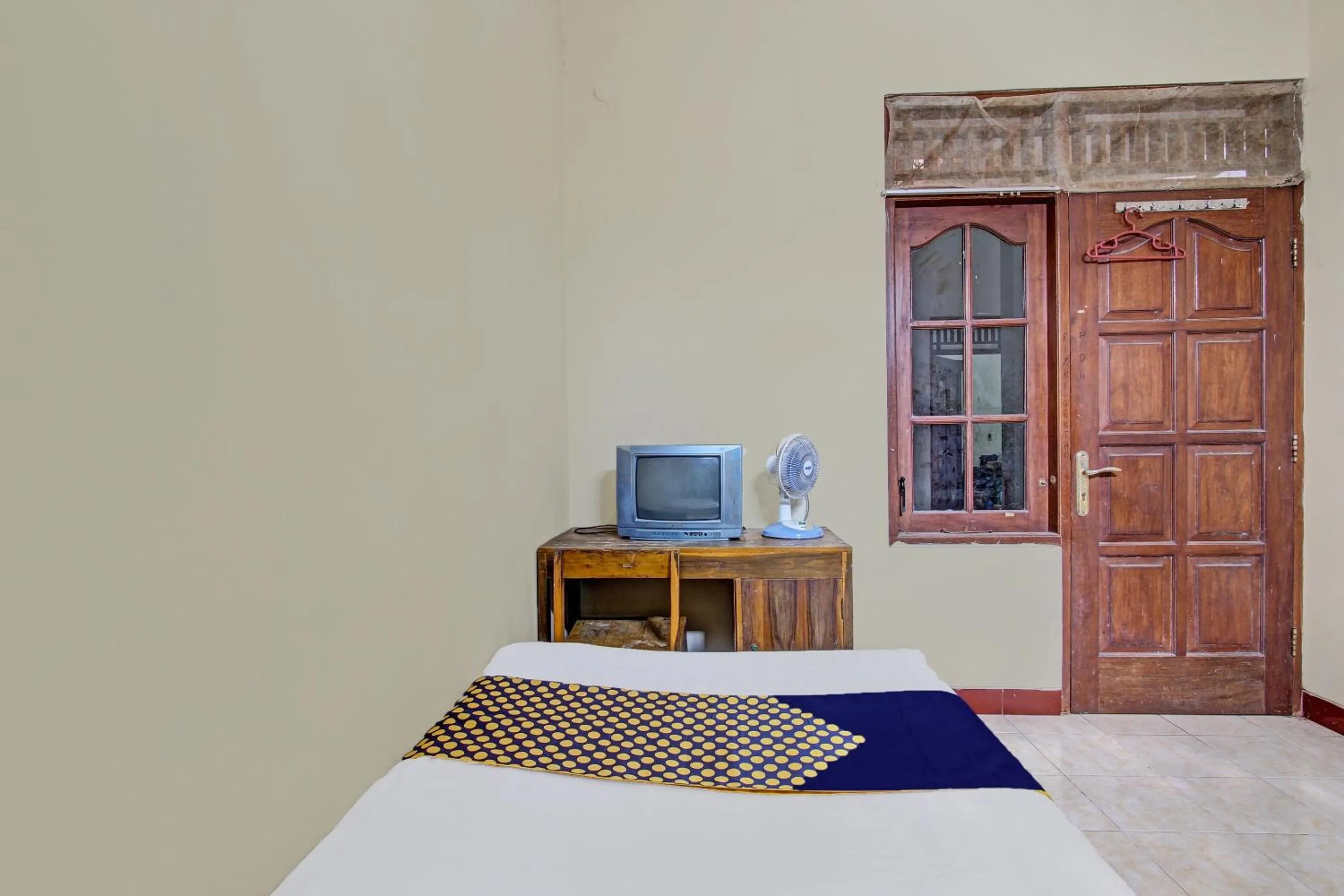 Bedroom in Hotel O Puri Kasih Guest House Syariah