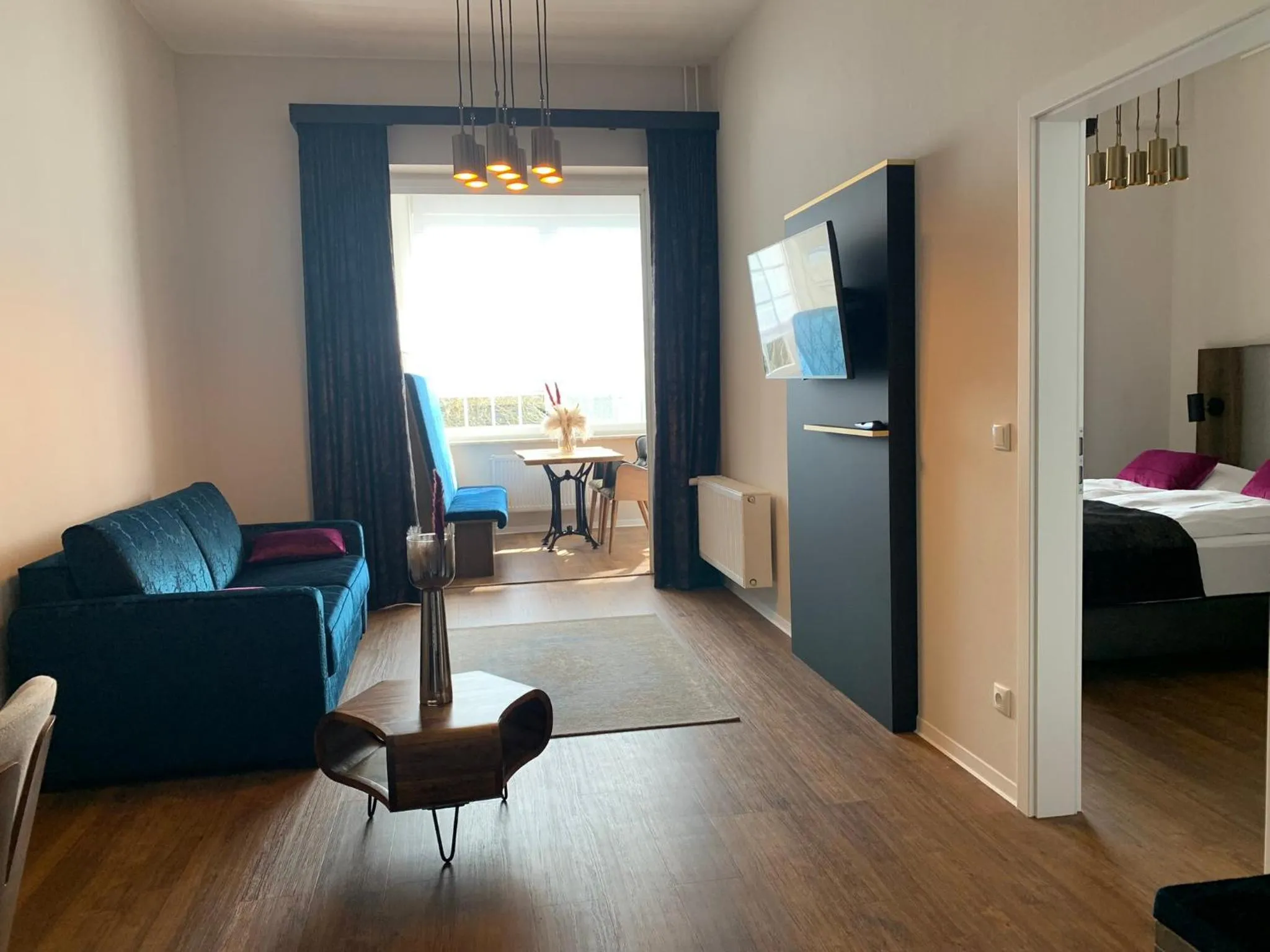 Living room, Bed in Residence Black Eagle Lubmin Strand