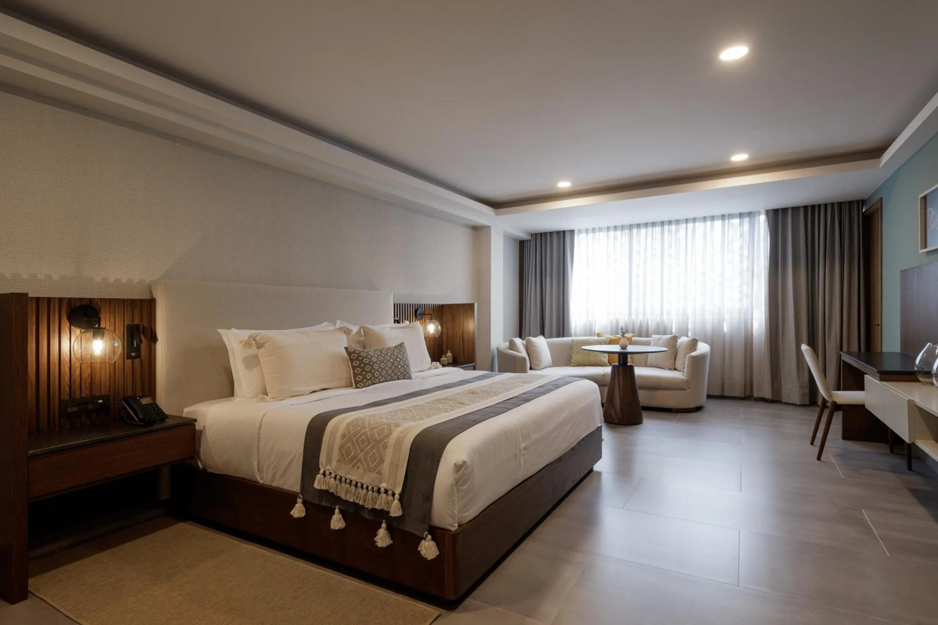 Bed in Origen 438 Luxury Boutique Hotel