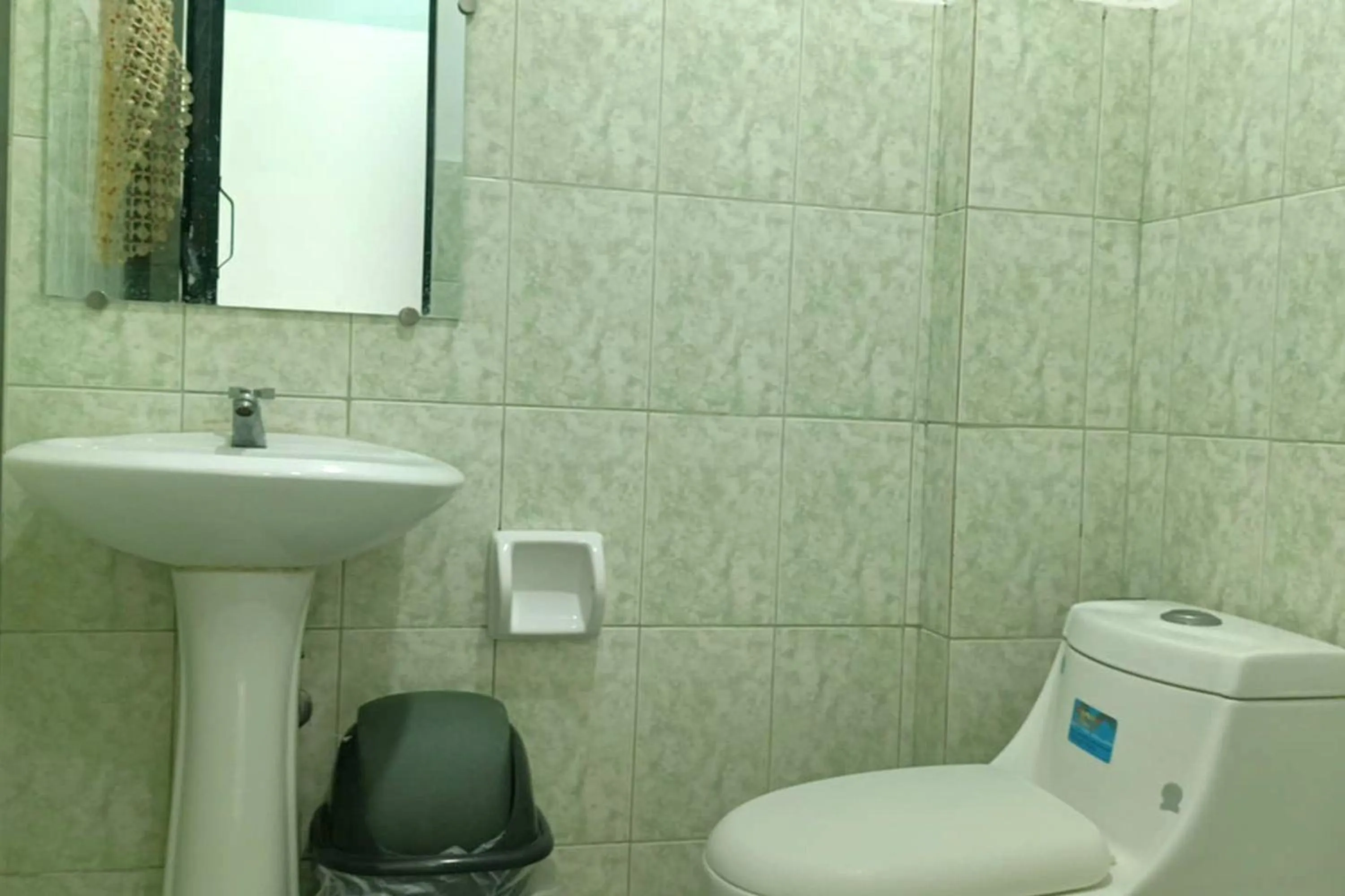 Toilet in EC Hotel near Laoag Airport