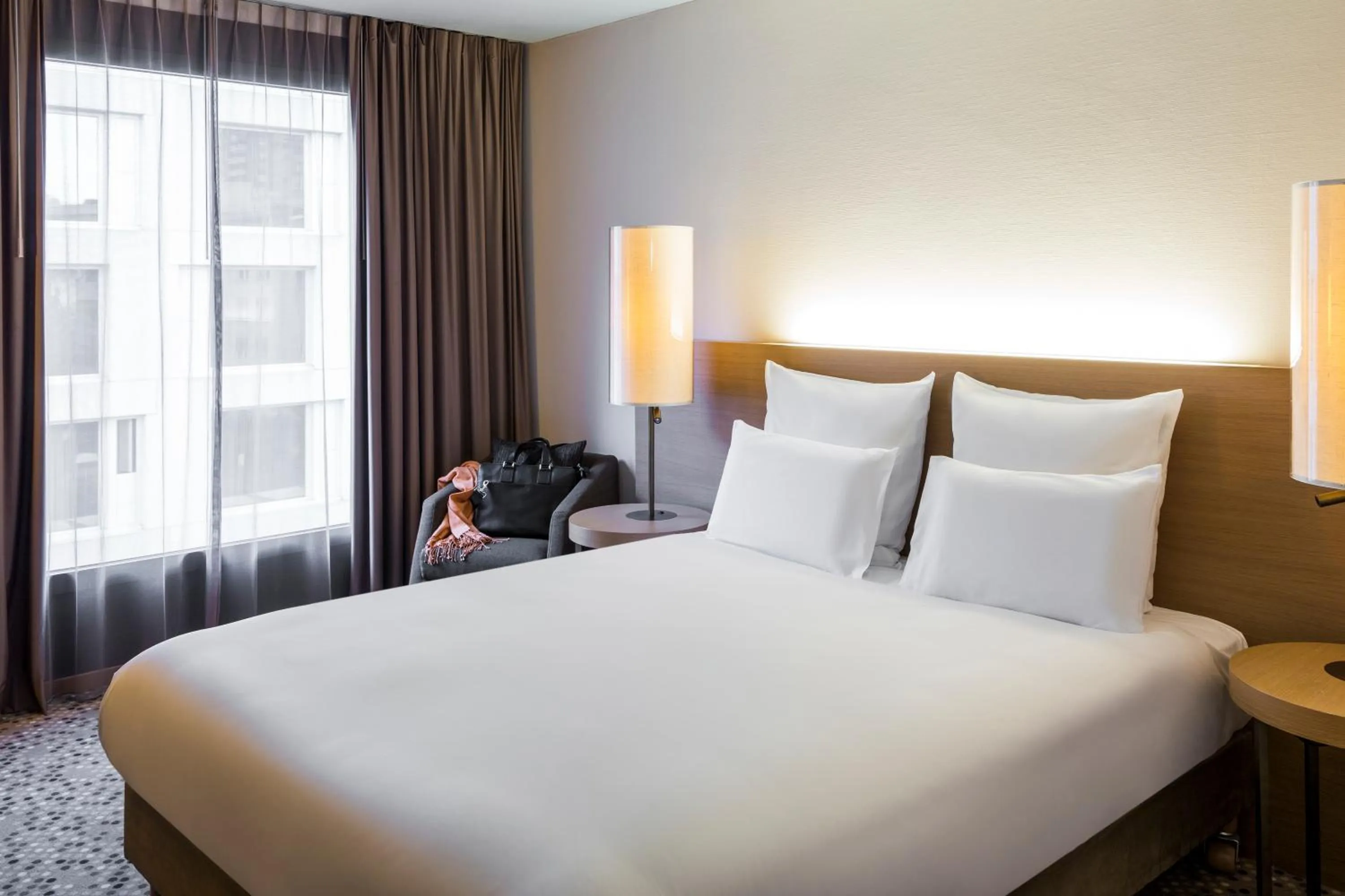 Photo of the whole room, Bed in Pullman Basel Europe