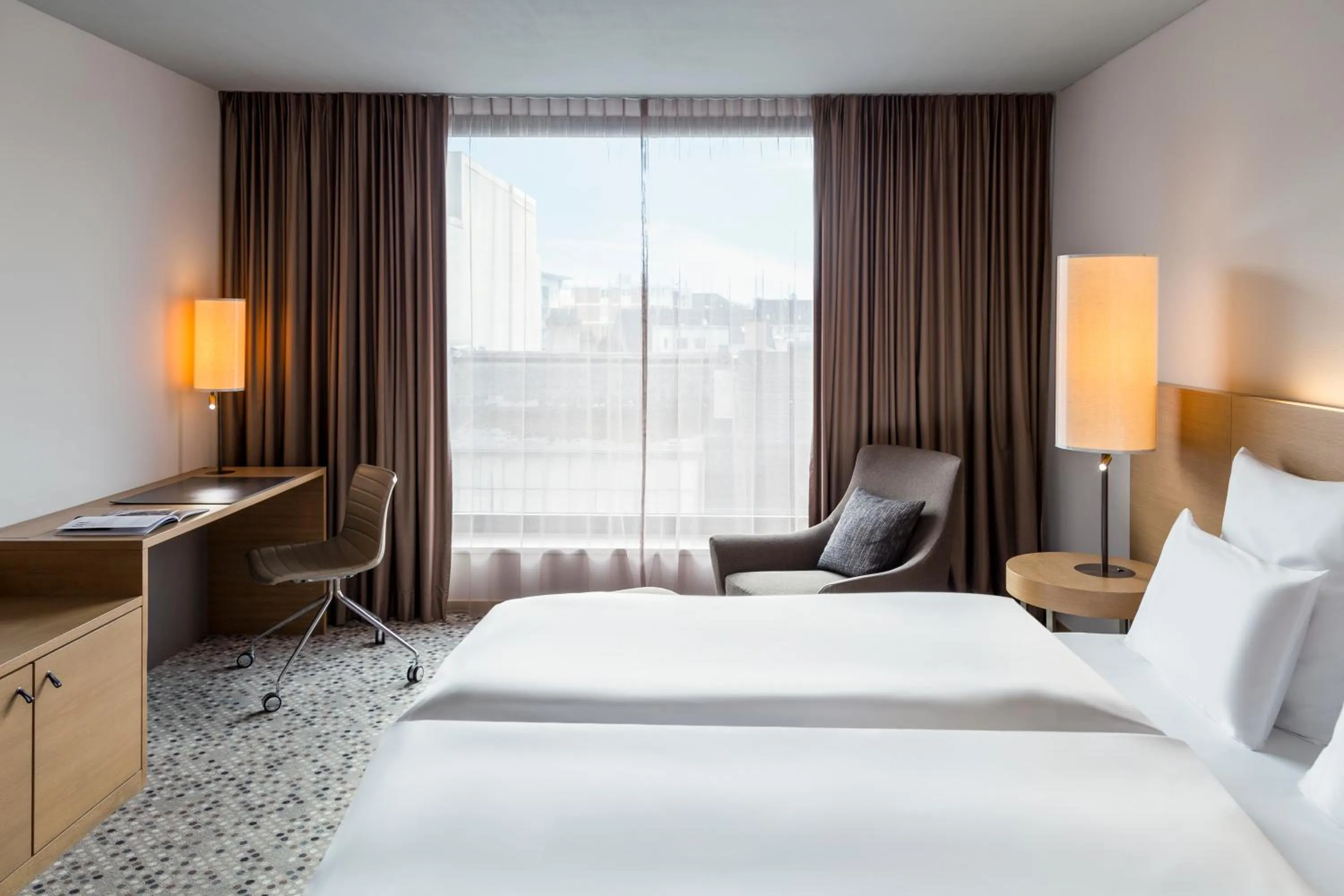 Photo of the whole room, Bed in Pullman Basel Europe