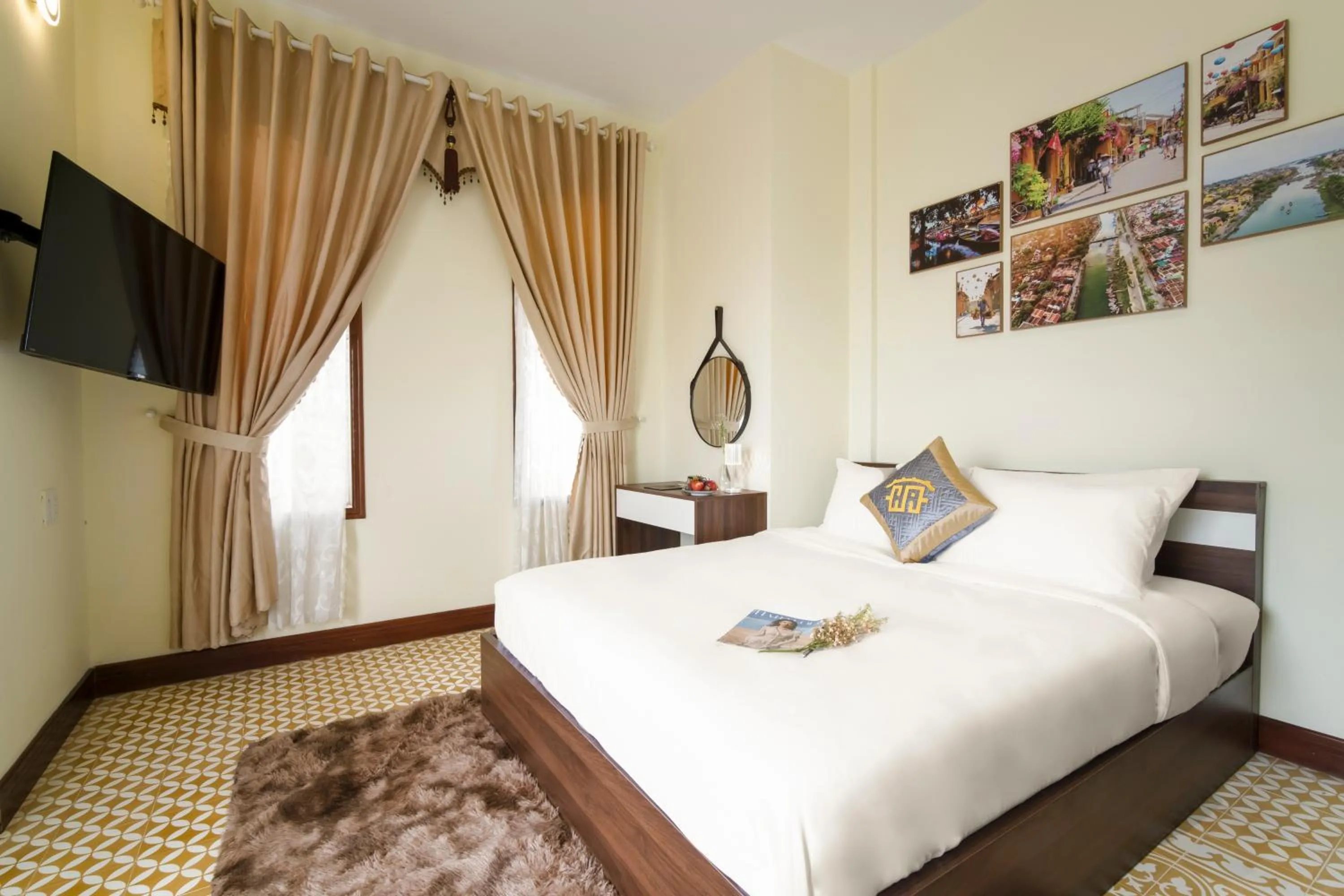 Bed in Hawal Boutique Villa Hoi An