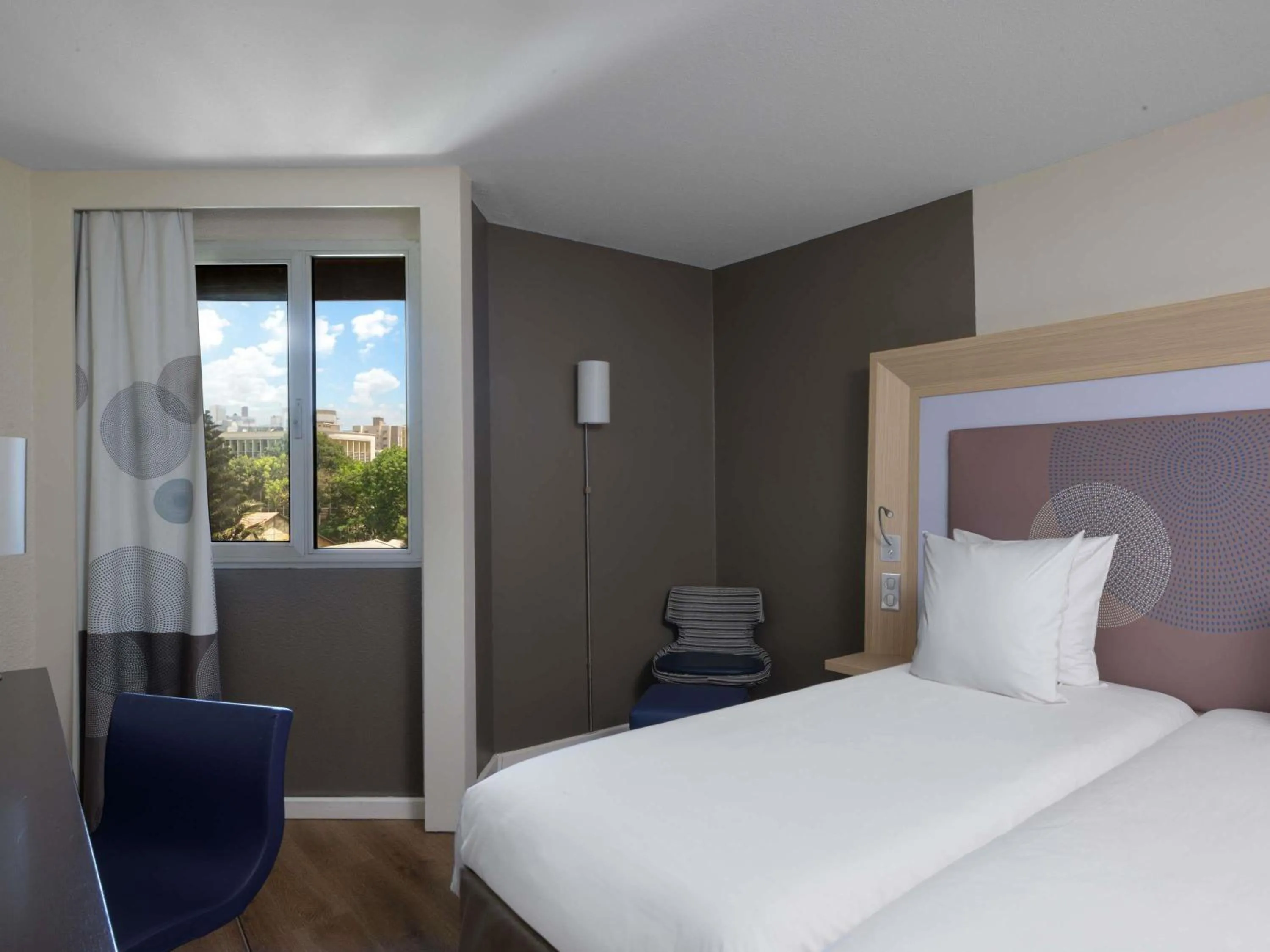 Bedroom, Bed in Novotel Dakar