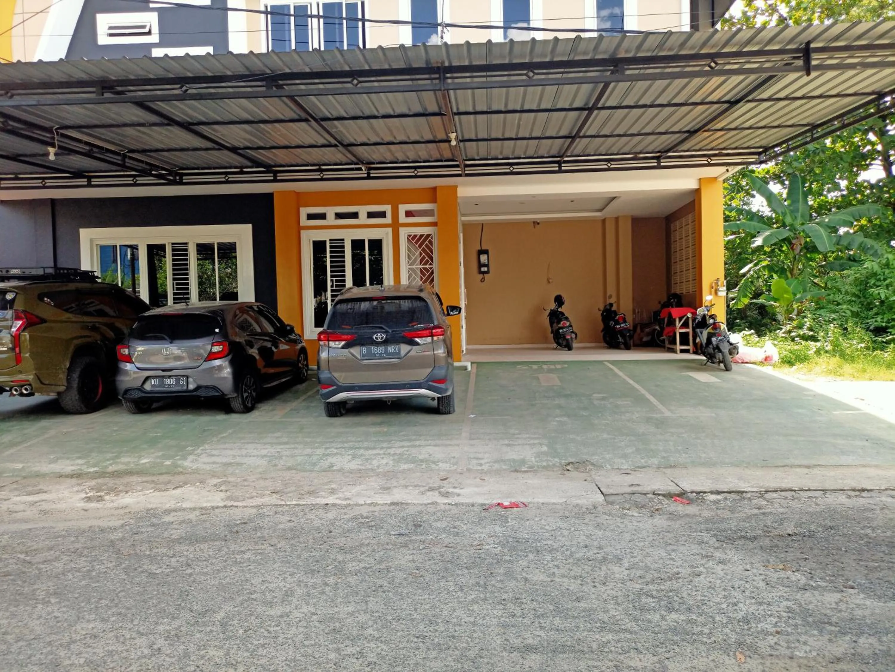 Facade/entrance in Hotel O Tri Homestay