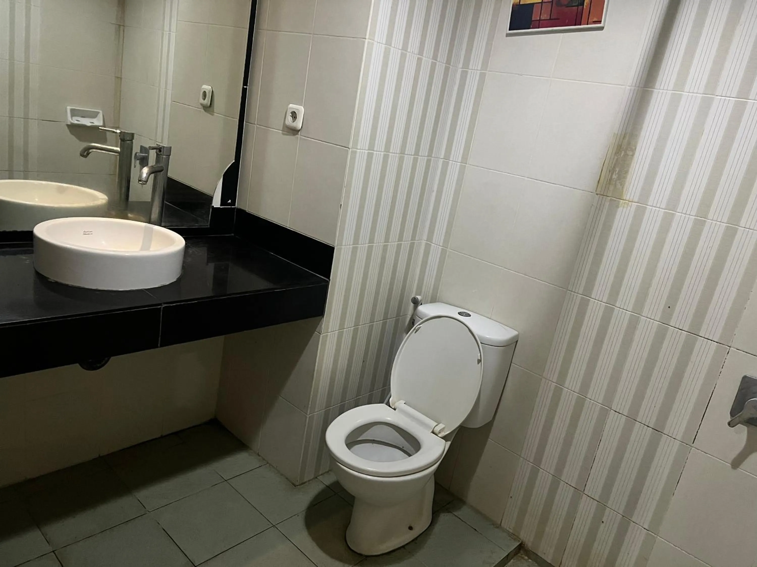 Bedroom in Hotel O Tri Homestay