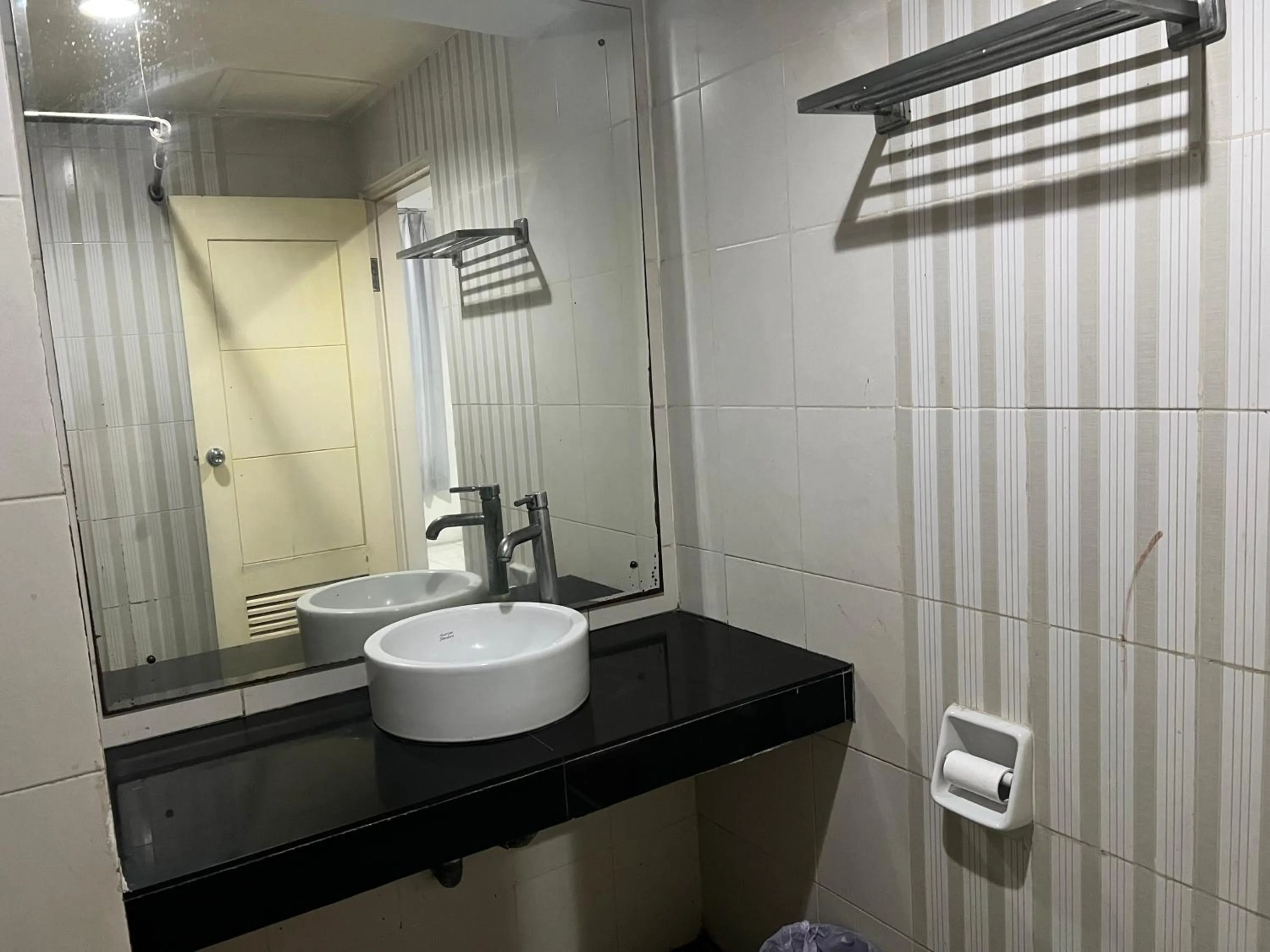 Bedroom in Hotel O Tri Homestay