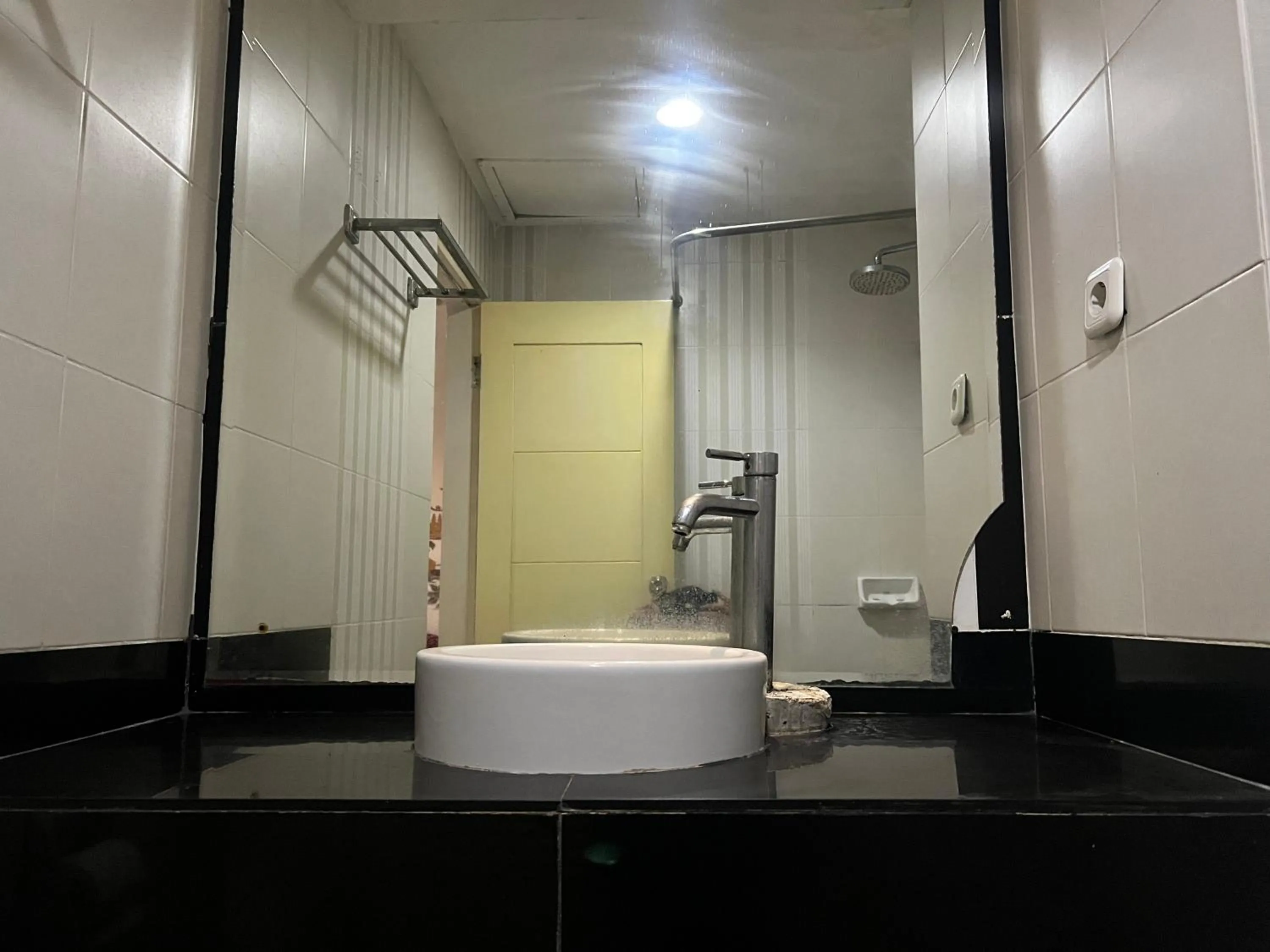 Bedroom in Hotel O Tri Homestay