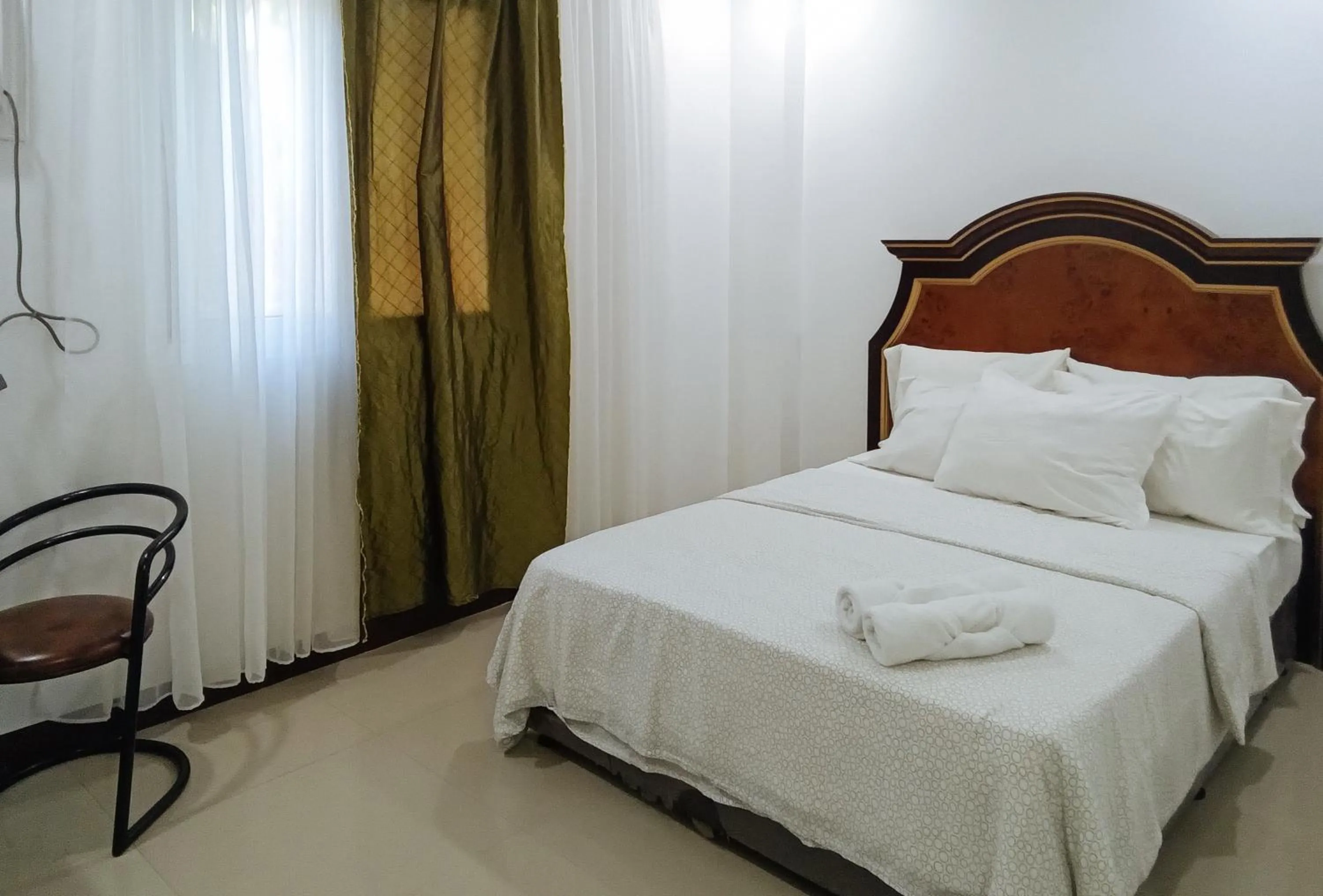 Bed in RedDoorz at Caree Boutique Hotel Bulan Sorsogon