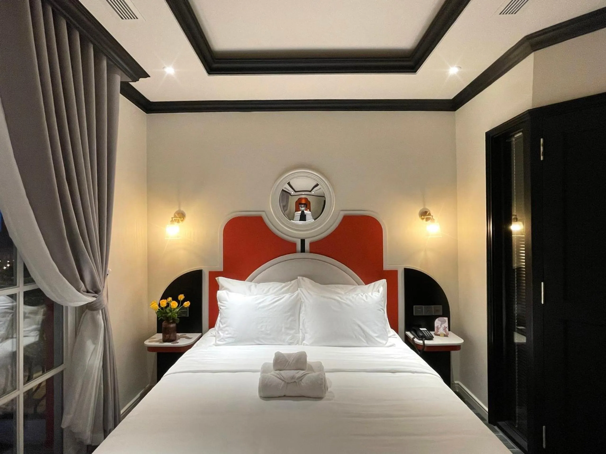 Bed in Le Bonheur Hotel