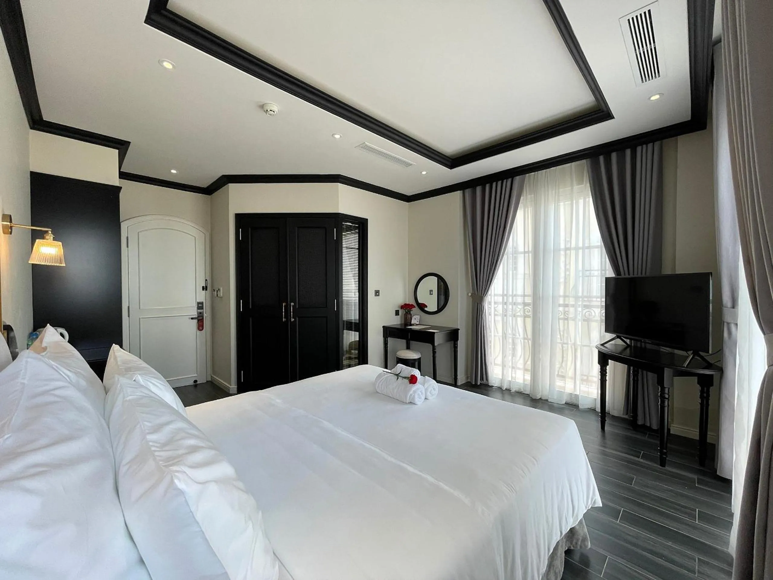 Bed in Le Bonheur Hotel