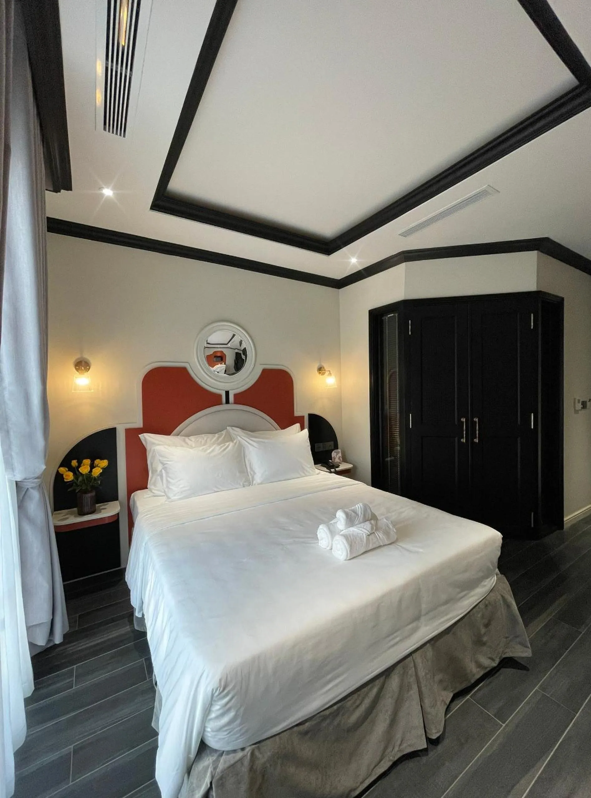 Bed in Le Bonheur Hotel