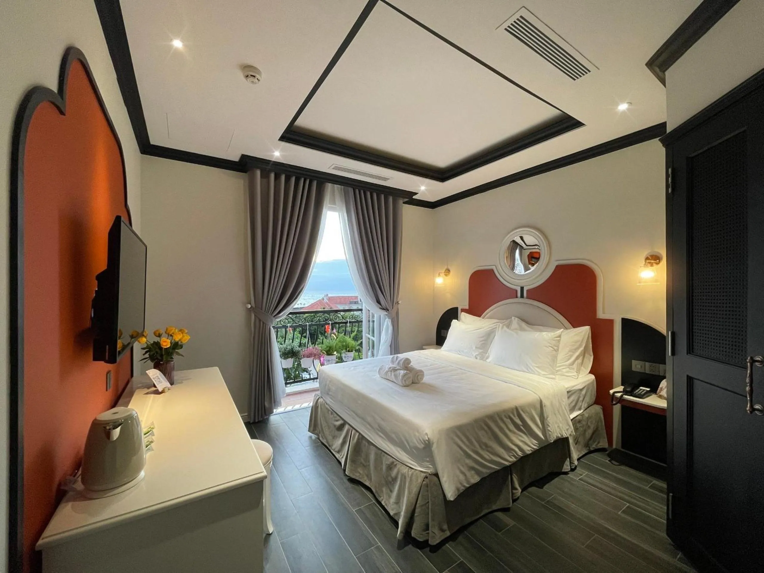 Bed in Le Bonheur Hotel