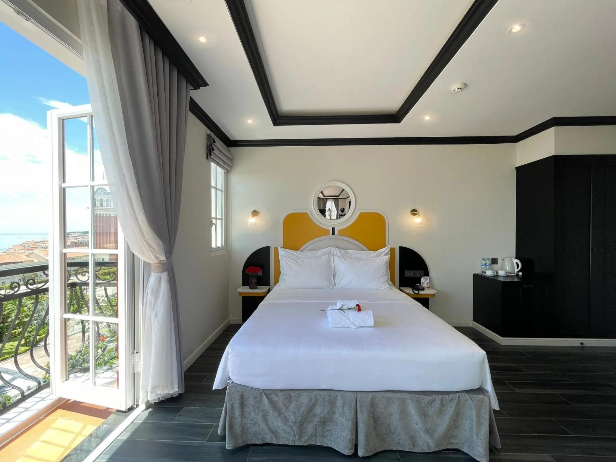 Bed in Le Bonheur Hotel