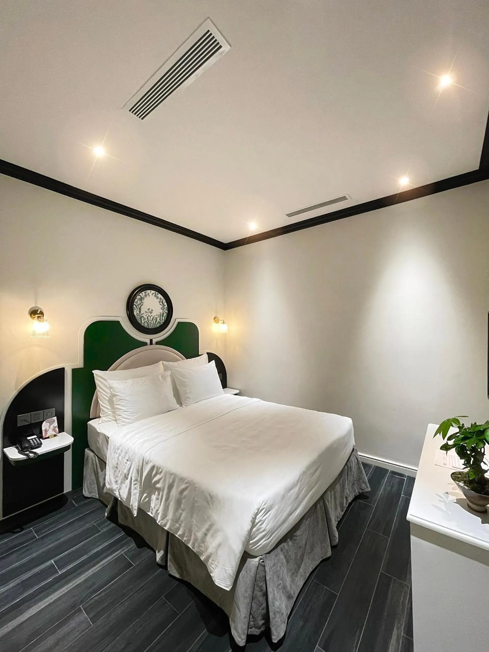 Bed in Le Bonheur Hotel