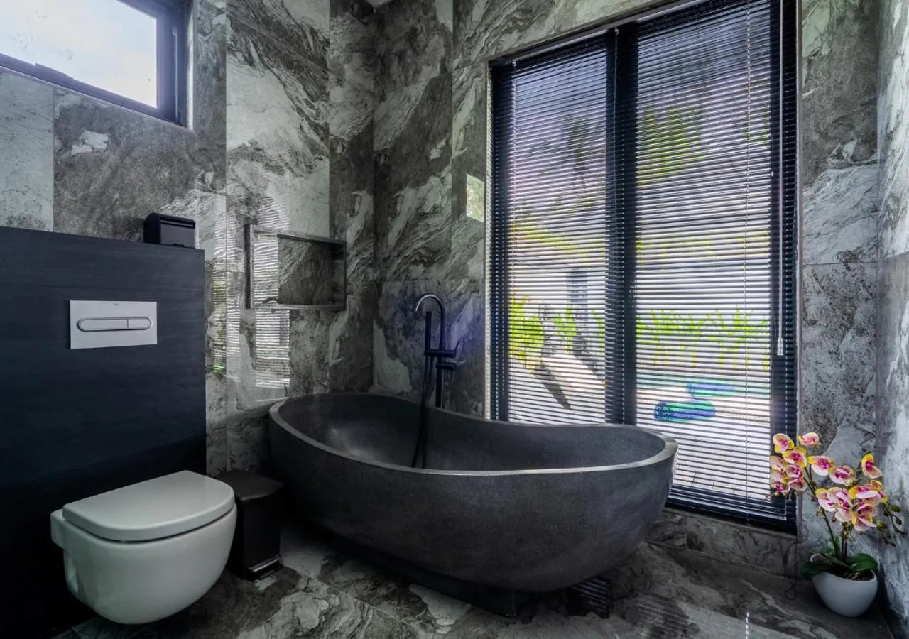 Toilet in Capung Asri Eco Luxury Resort with Private Pool Villas