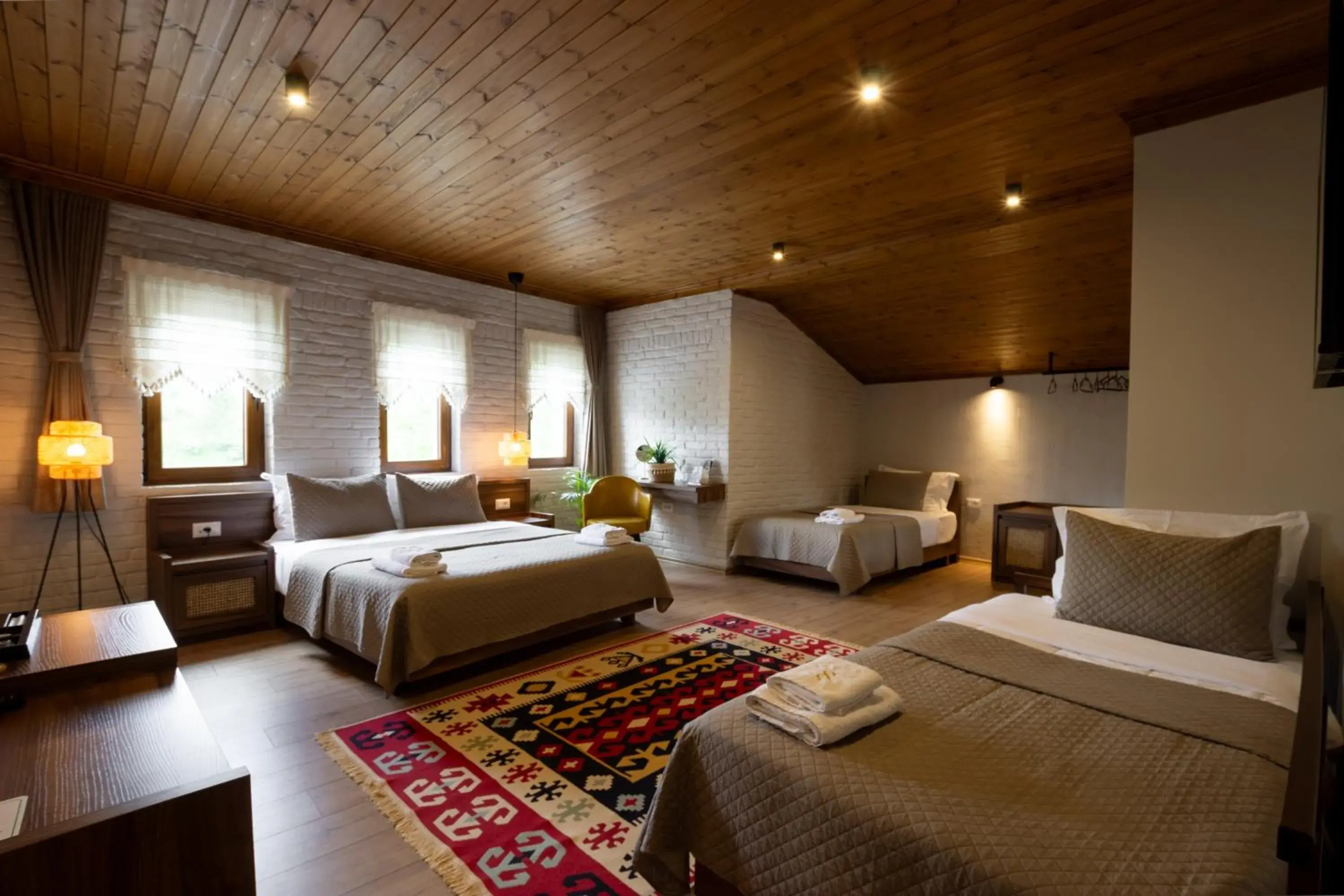 Deluxe Quadruple Room in The Stone Sky Hotel Deluxe Quadruple Room in The Stone Sky Hotel