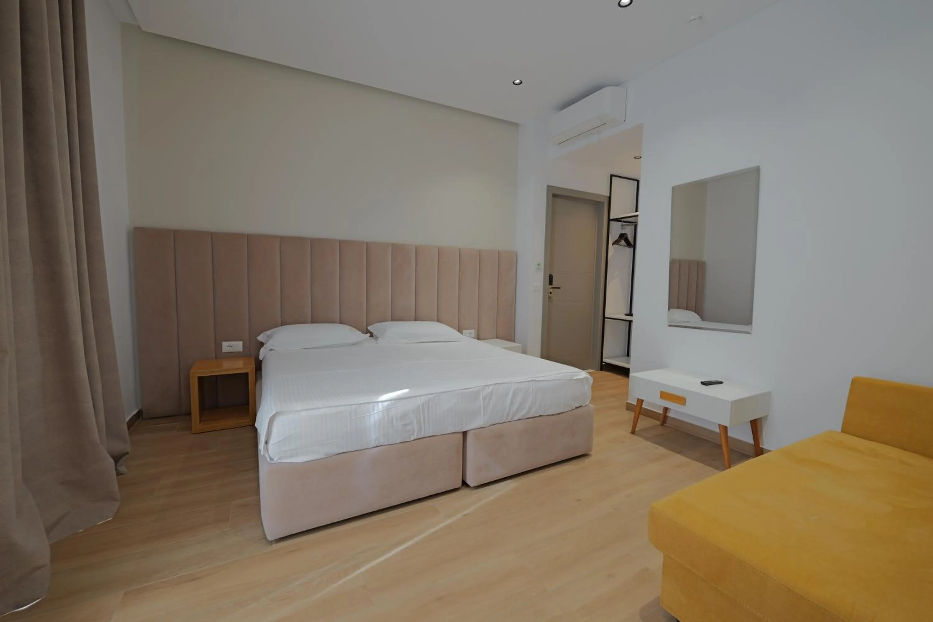 Communal lounge/ TV room, Bed in Sea & Sand Hotel