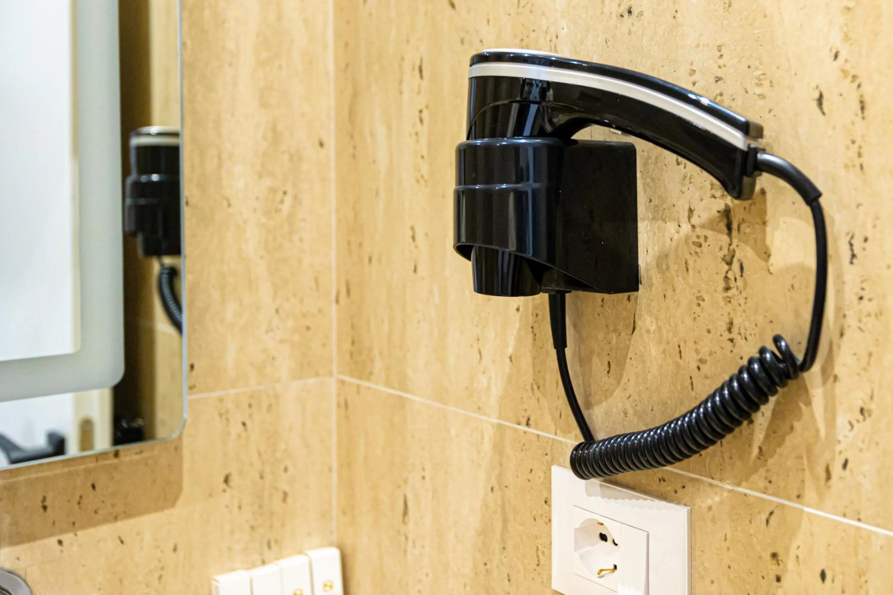 hair dryier in Sea & Sand Hotel