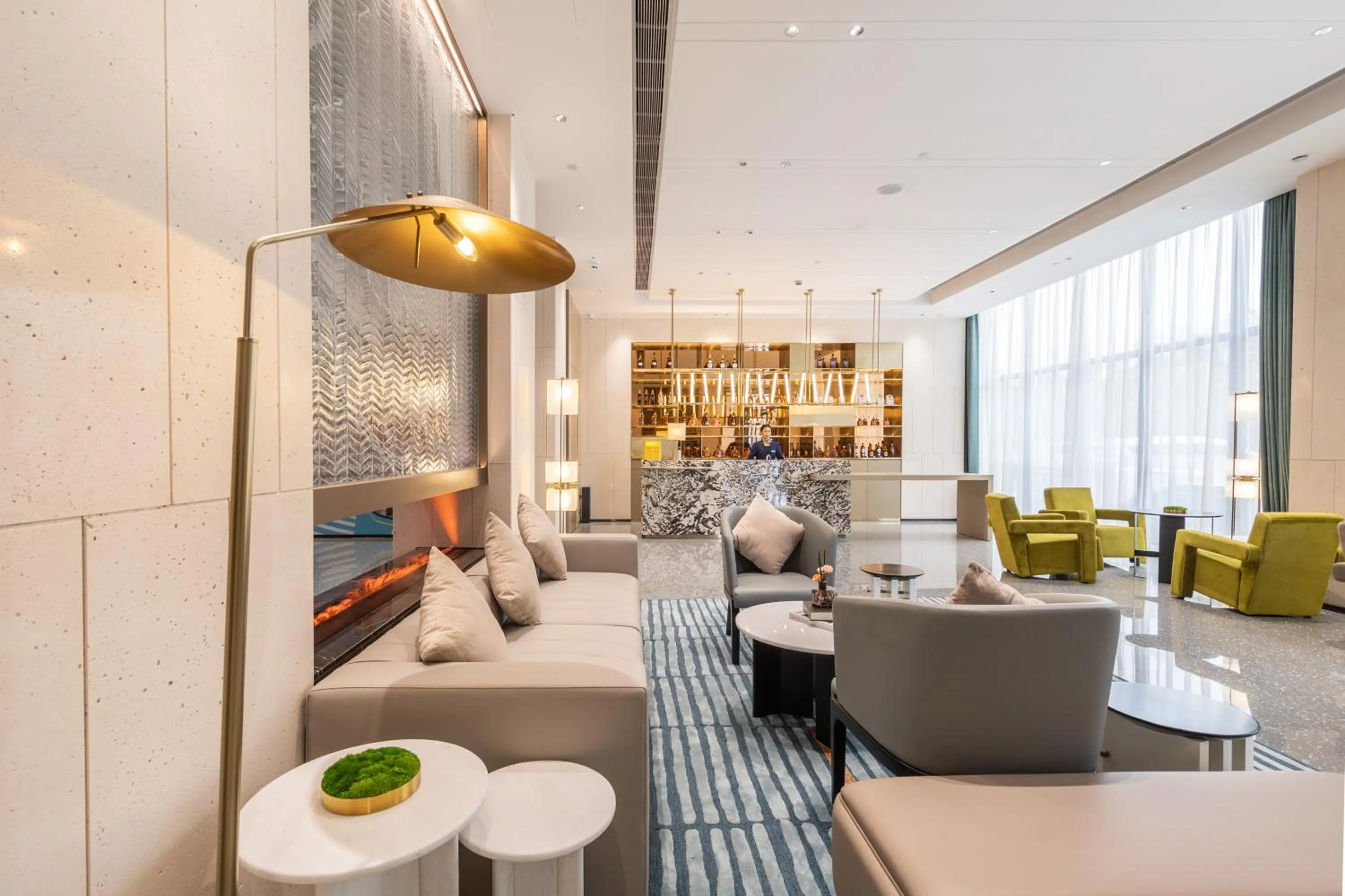 Seating area in Guangzhou Baiyun Airport MeHood Liz Hotel