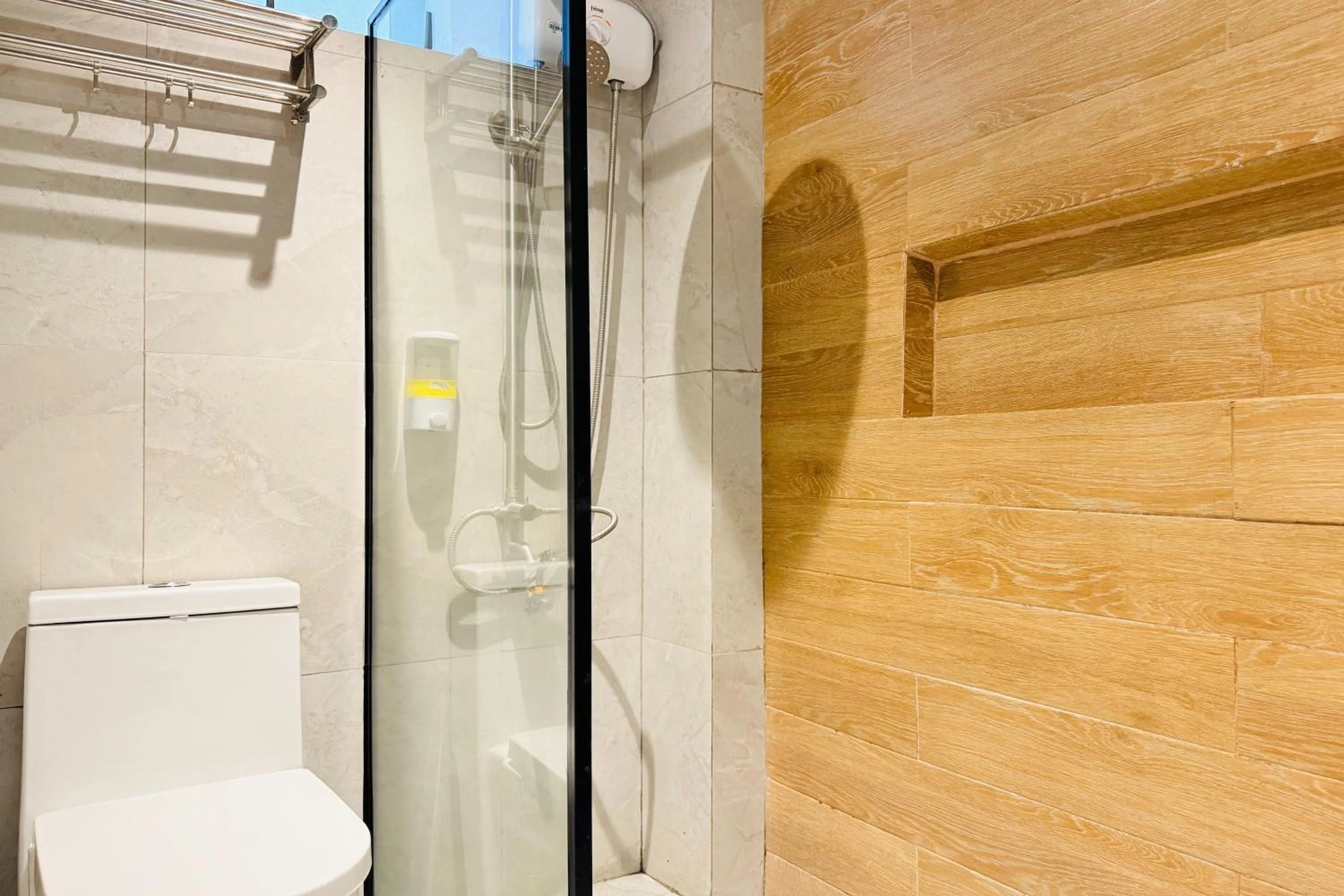 Shower in Aurora Suites Pasay near Airport