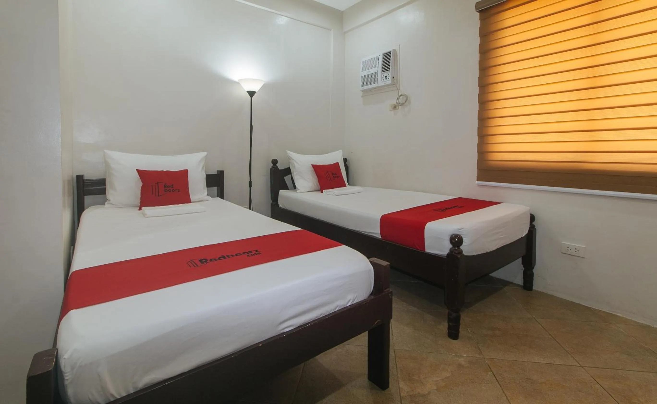 Bed in RedDoorz at Davids Travellers Inn Cavite