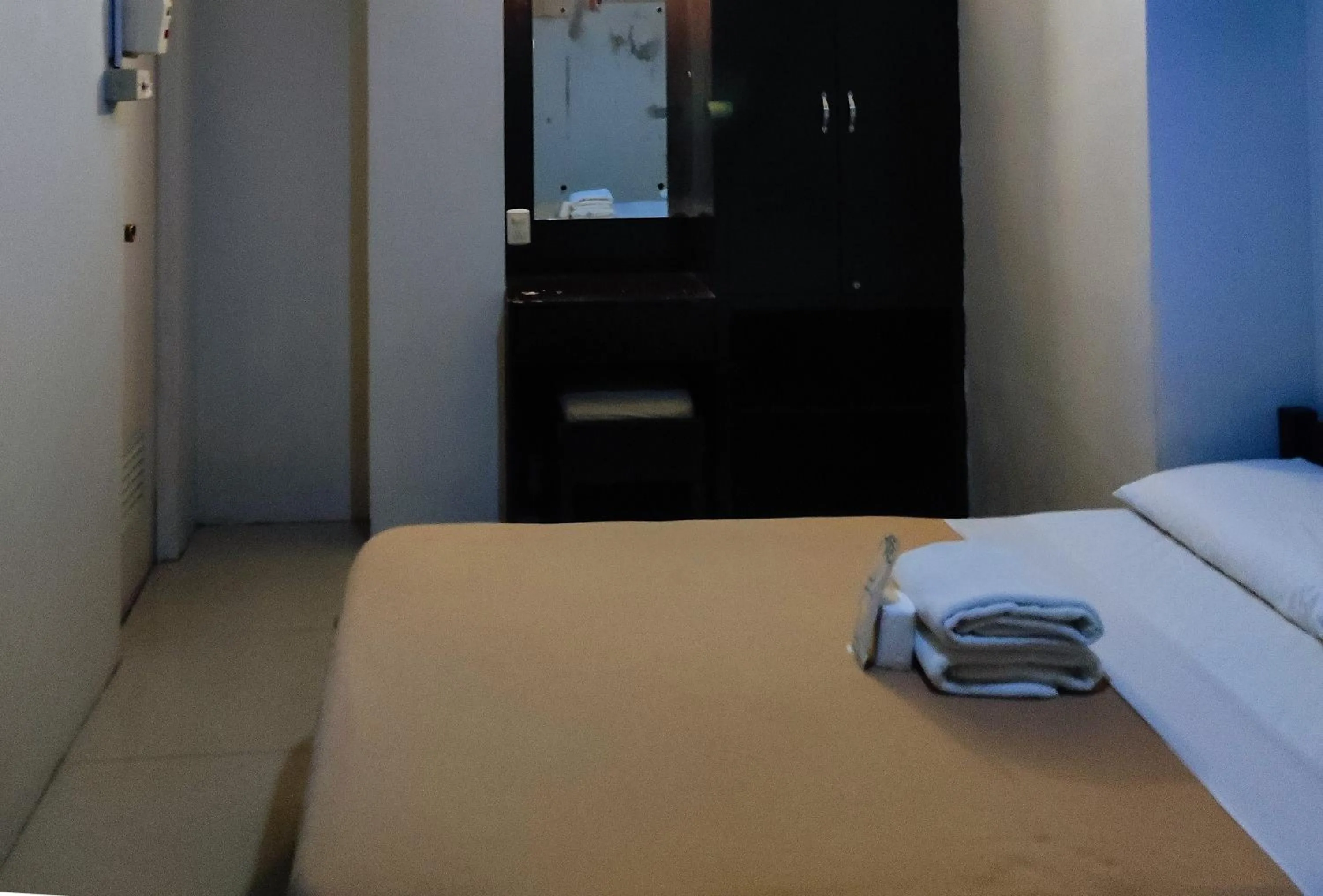 Bed in Jade Dragons Suites Davao