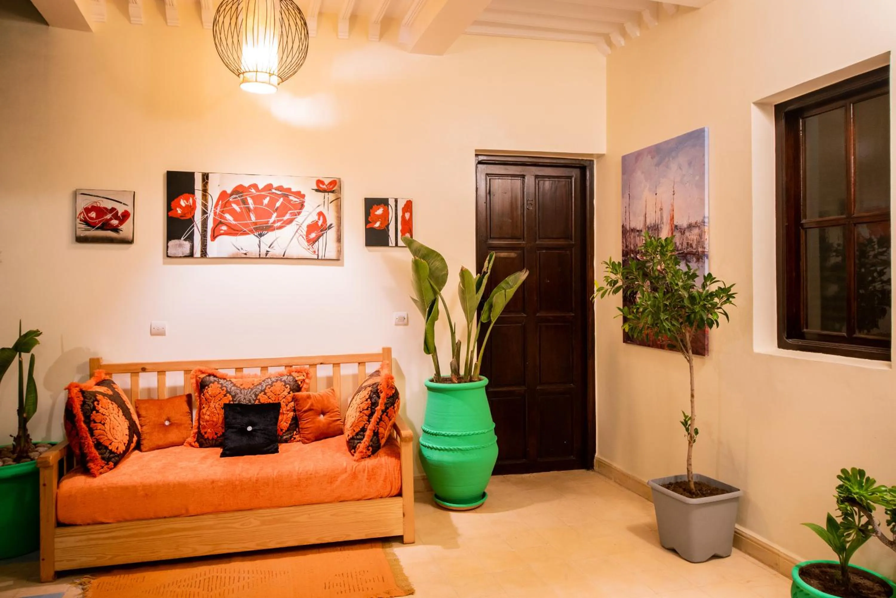 Seating area, Bed in Riad Asmitou