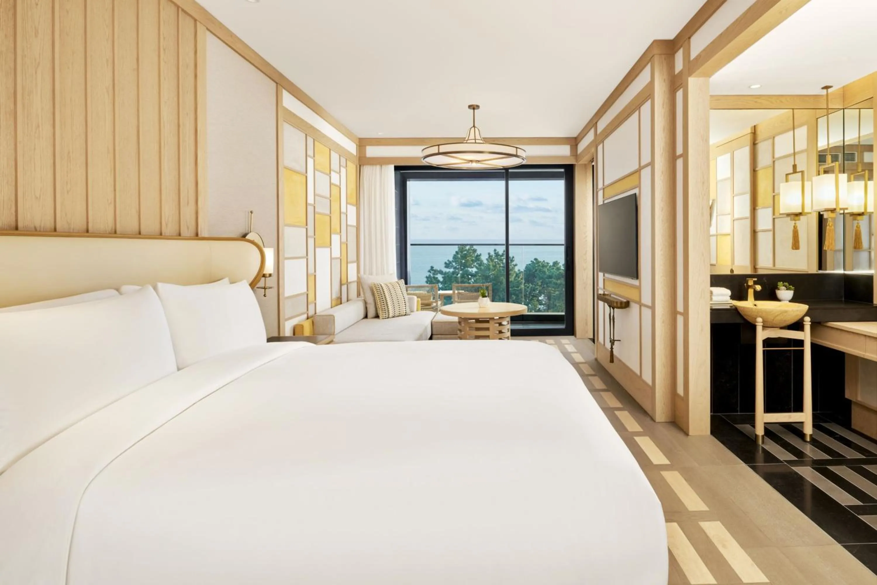 Photo of the whole room, Bed in JW Marriott Jeju Resort & Spa