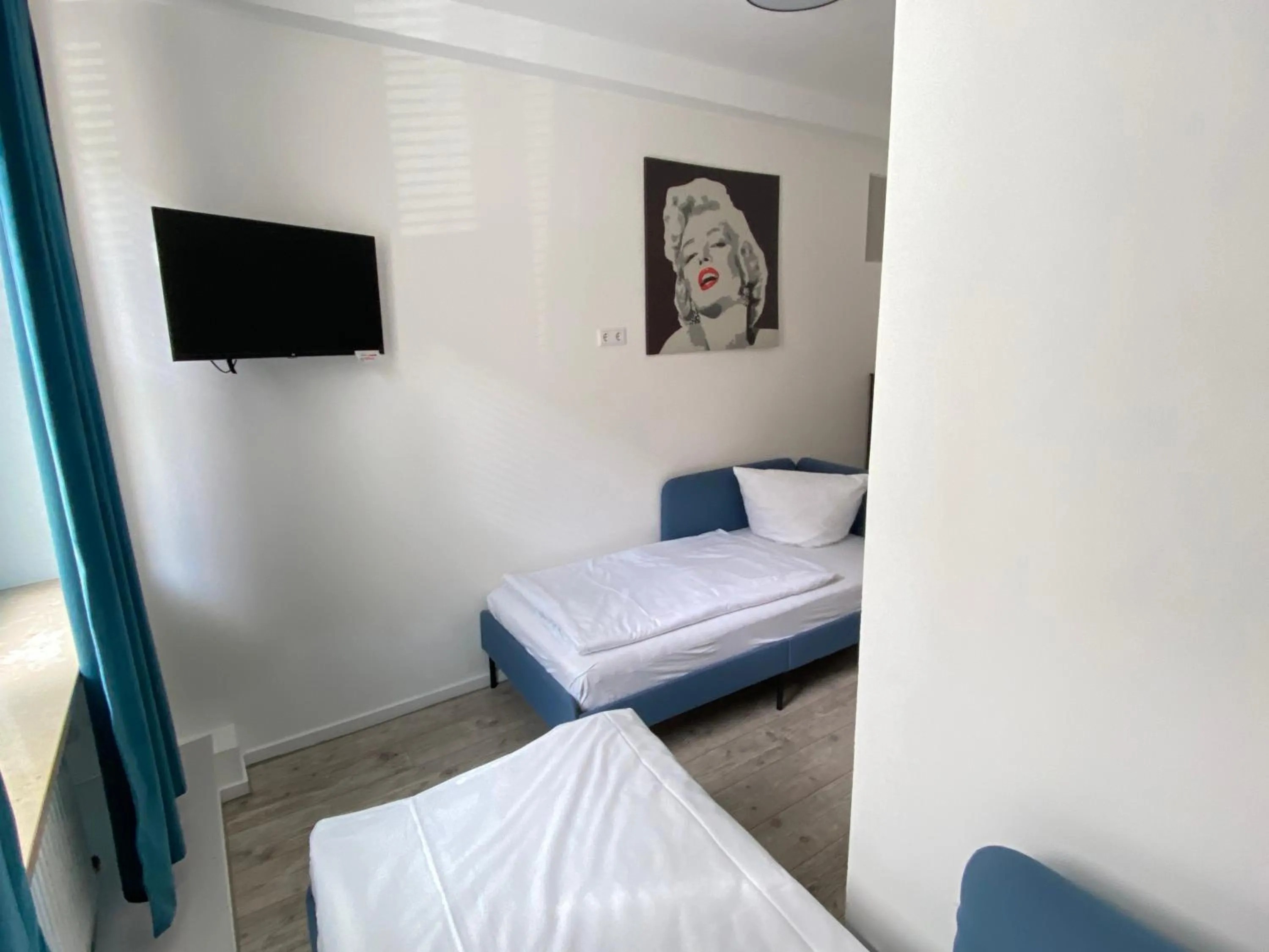 Bedroom, Bed in LUXOMES: Aparthotel Nürnberg Zentrum Süd