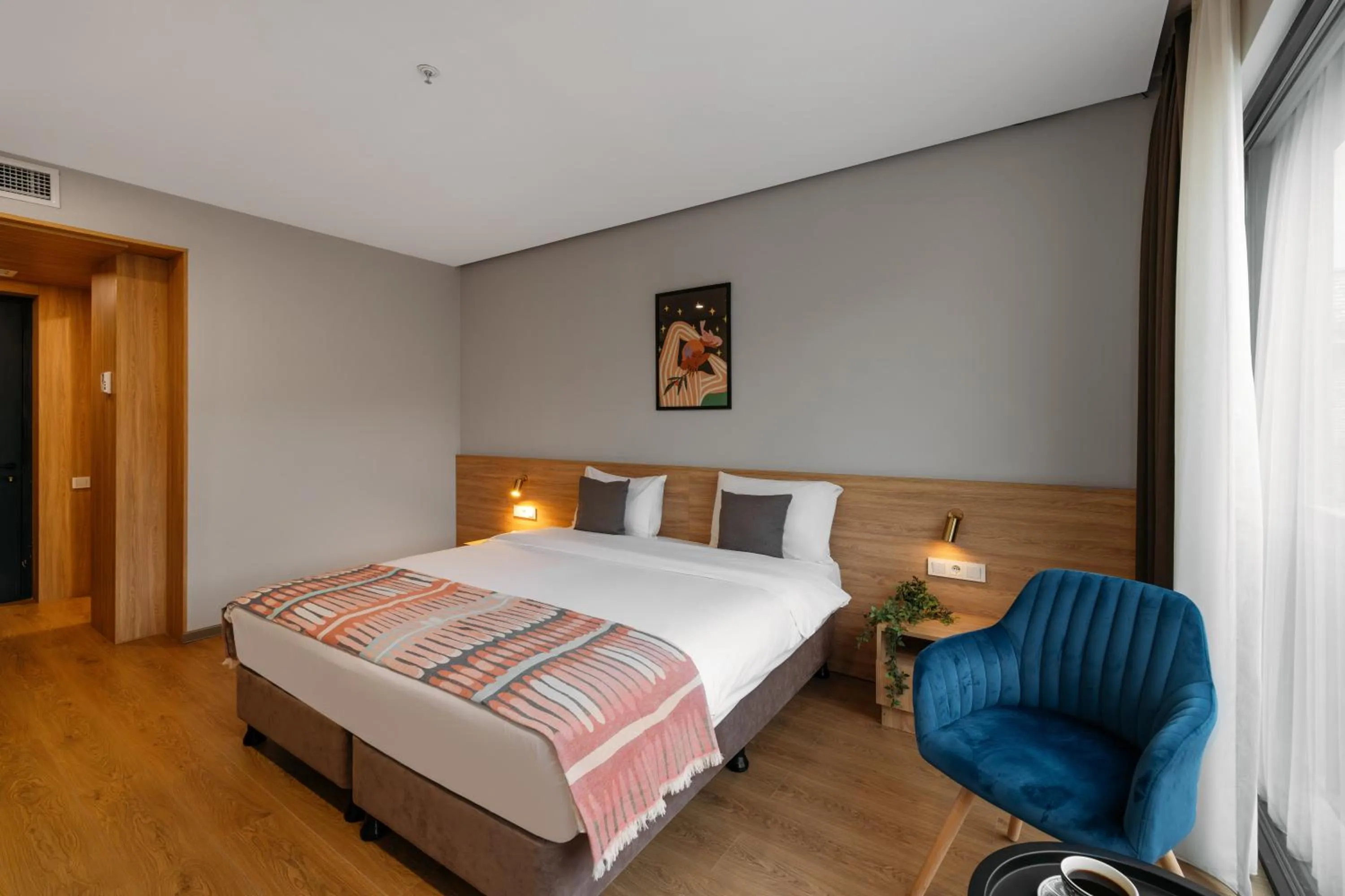 Bed in Hotel Memoir Kazbegi by DNT Group