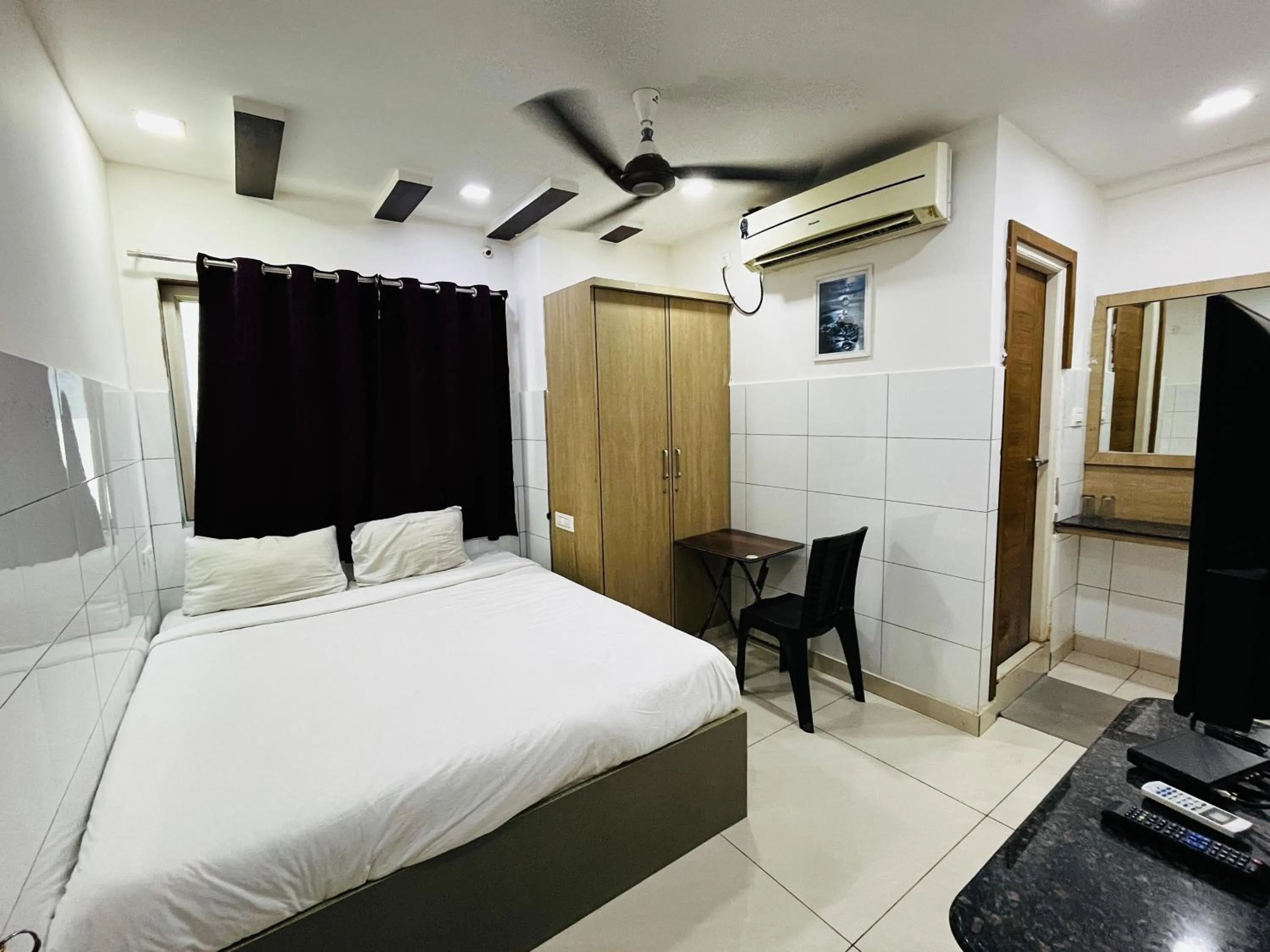 Bed in HOTEL ROYAL SUITES AND ROOMS Near AIG Hospital Gachibowli