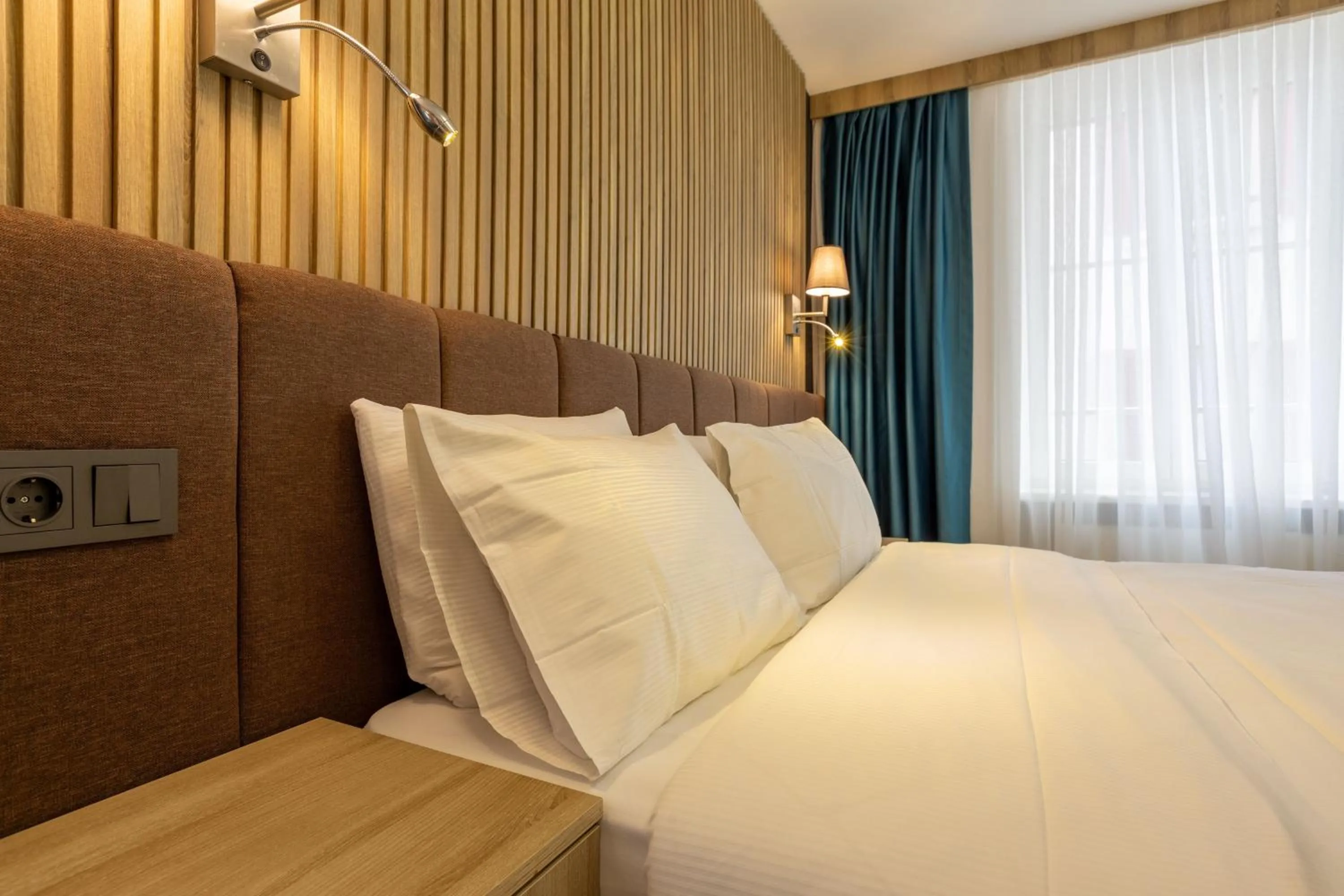 Bed in Nani City Hotel Self Check-In