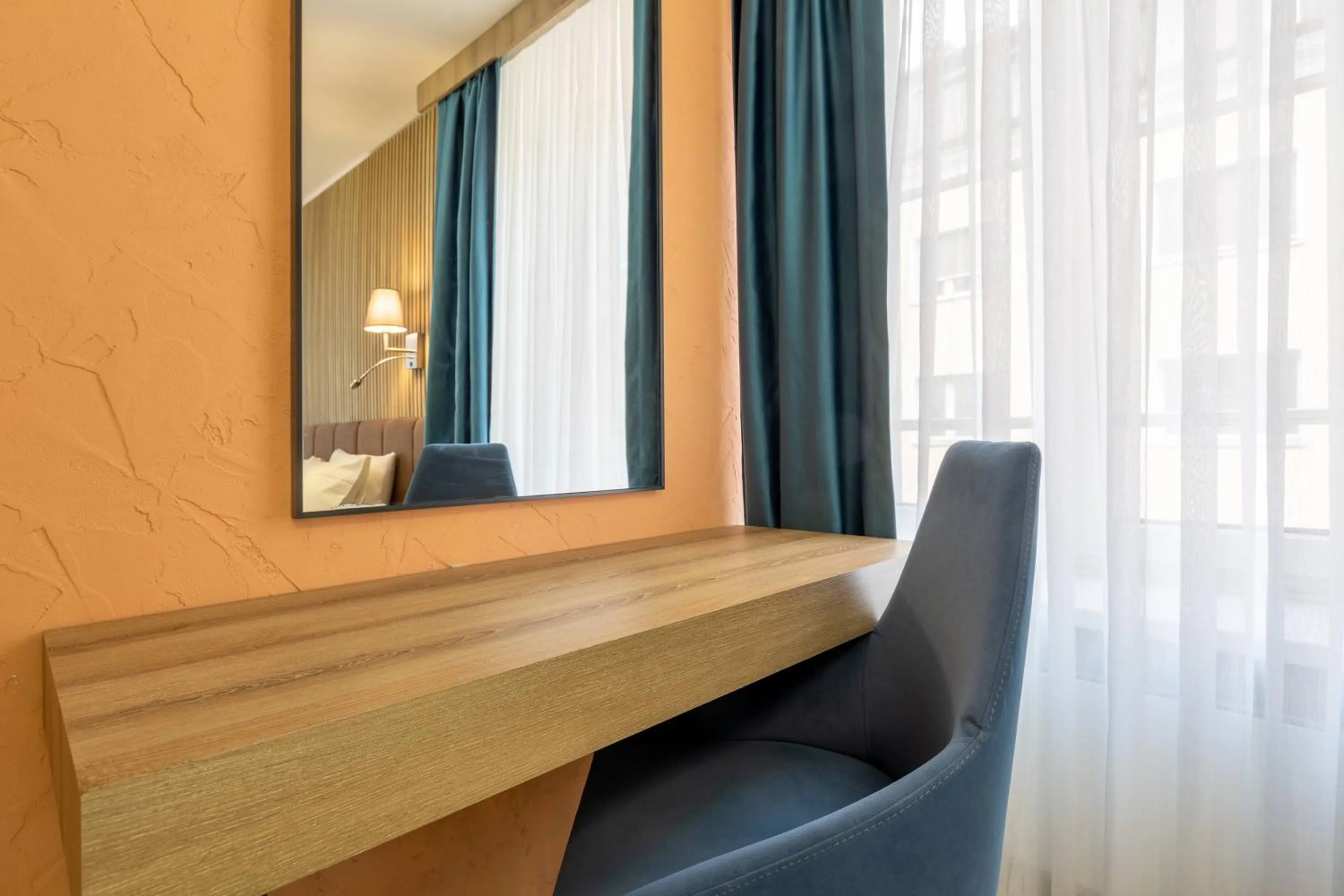 Seating area in Nani City Hotel Self Check-In