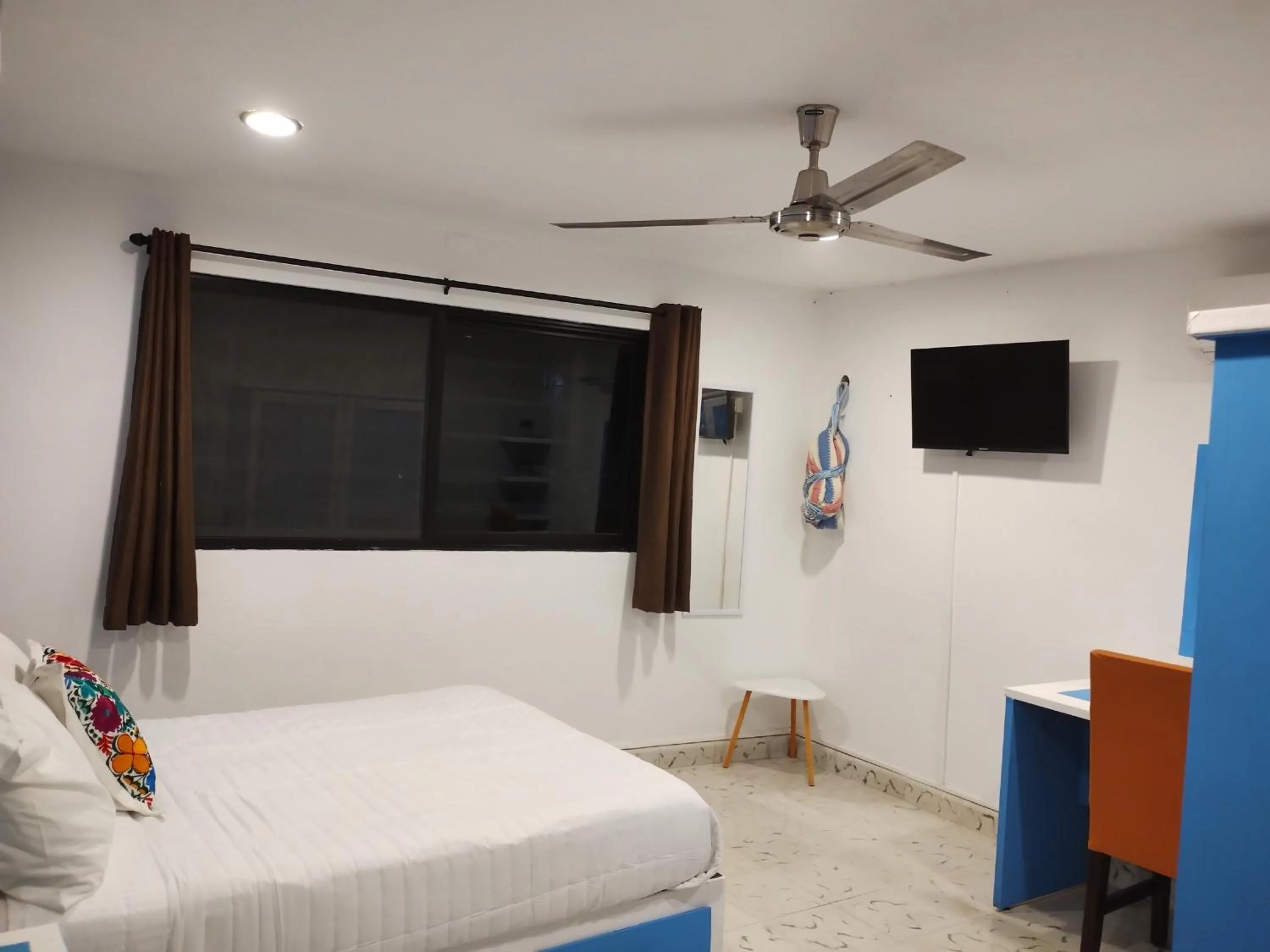 Bed in T´úubul K´iin Bed & Breakfast