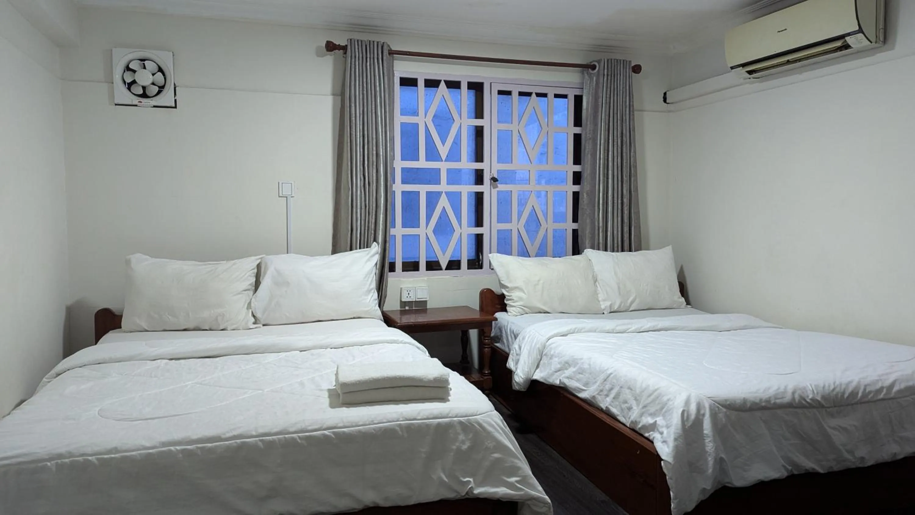 Bed in Empire House, Phnom Penh