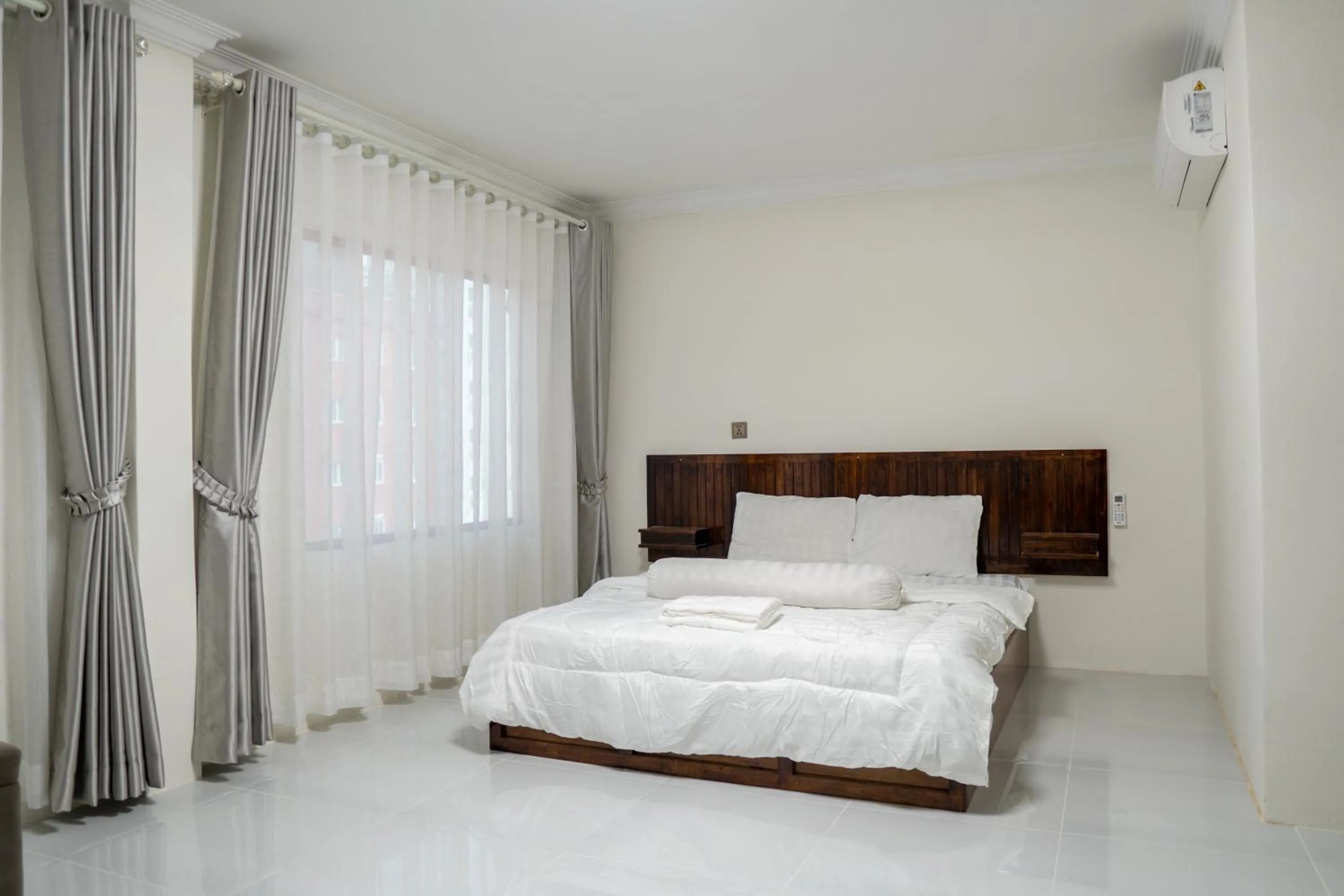 Bed in Empire House, Phnom Penh