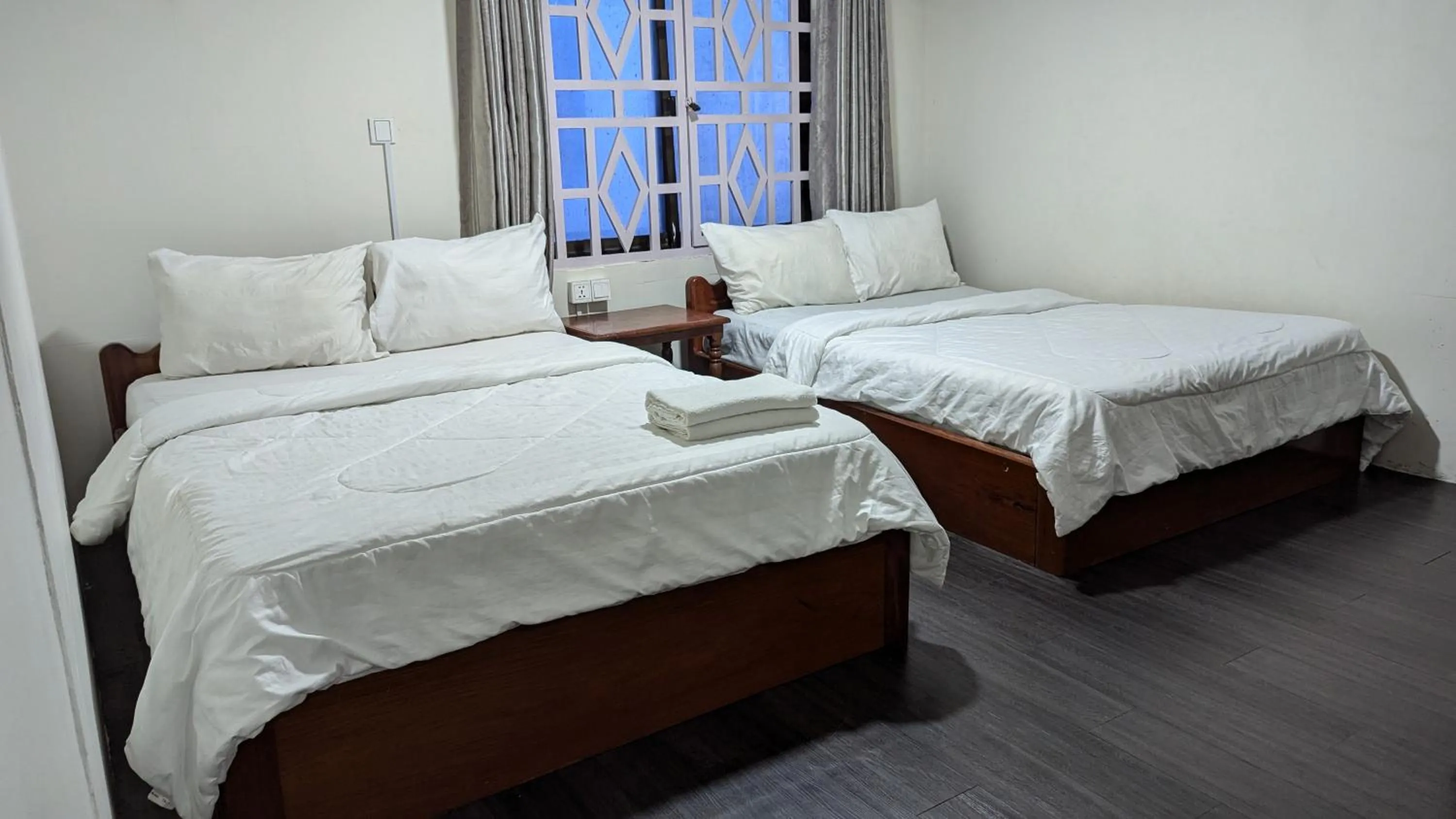 Bed in Empire House, Phnom Penh