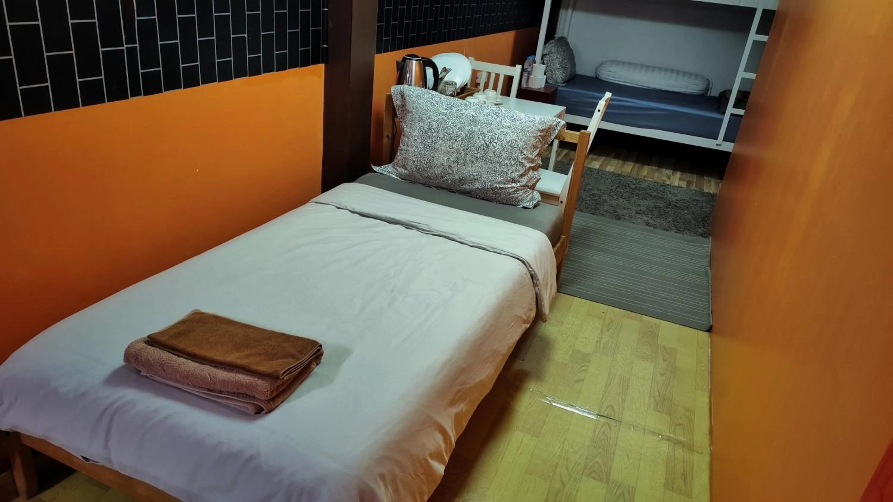 Bed in Doodle Lodge Bangkok