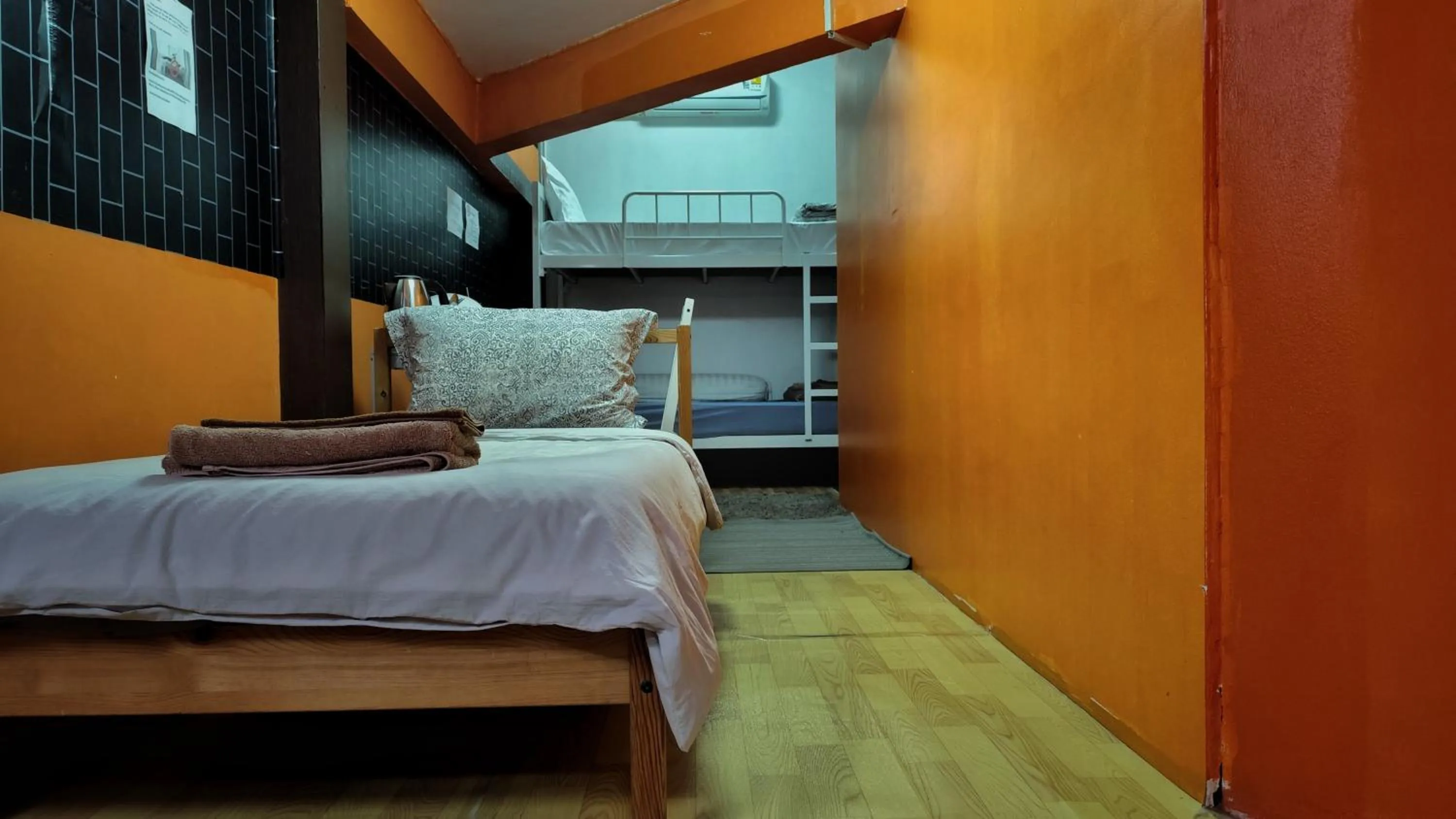 Bed in Doodle Lodge Bangkok