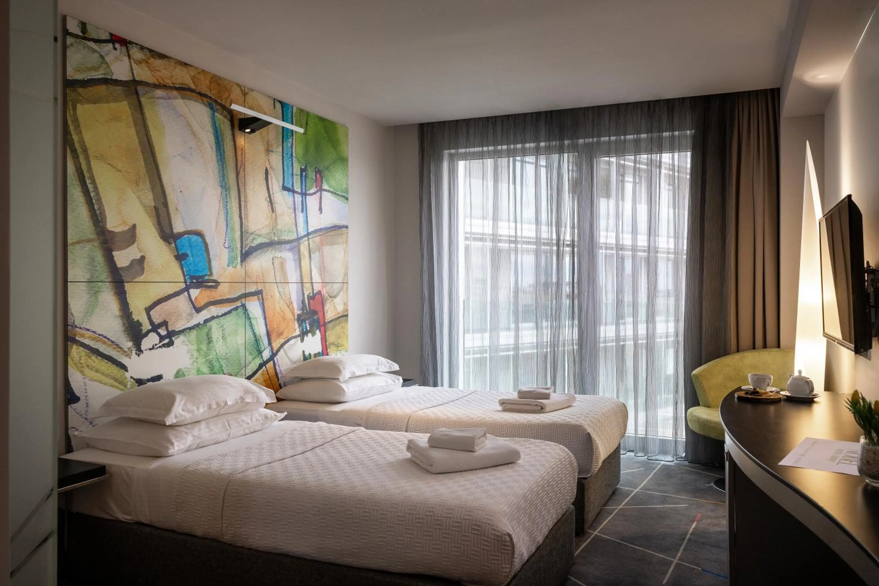 Bed in Nobel Zira Hotel