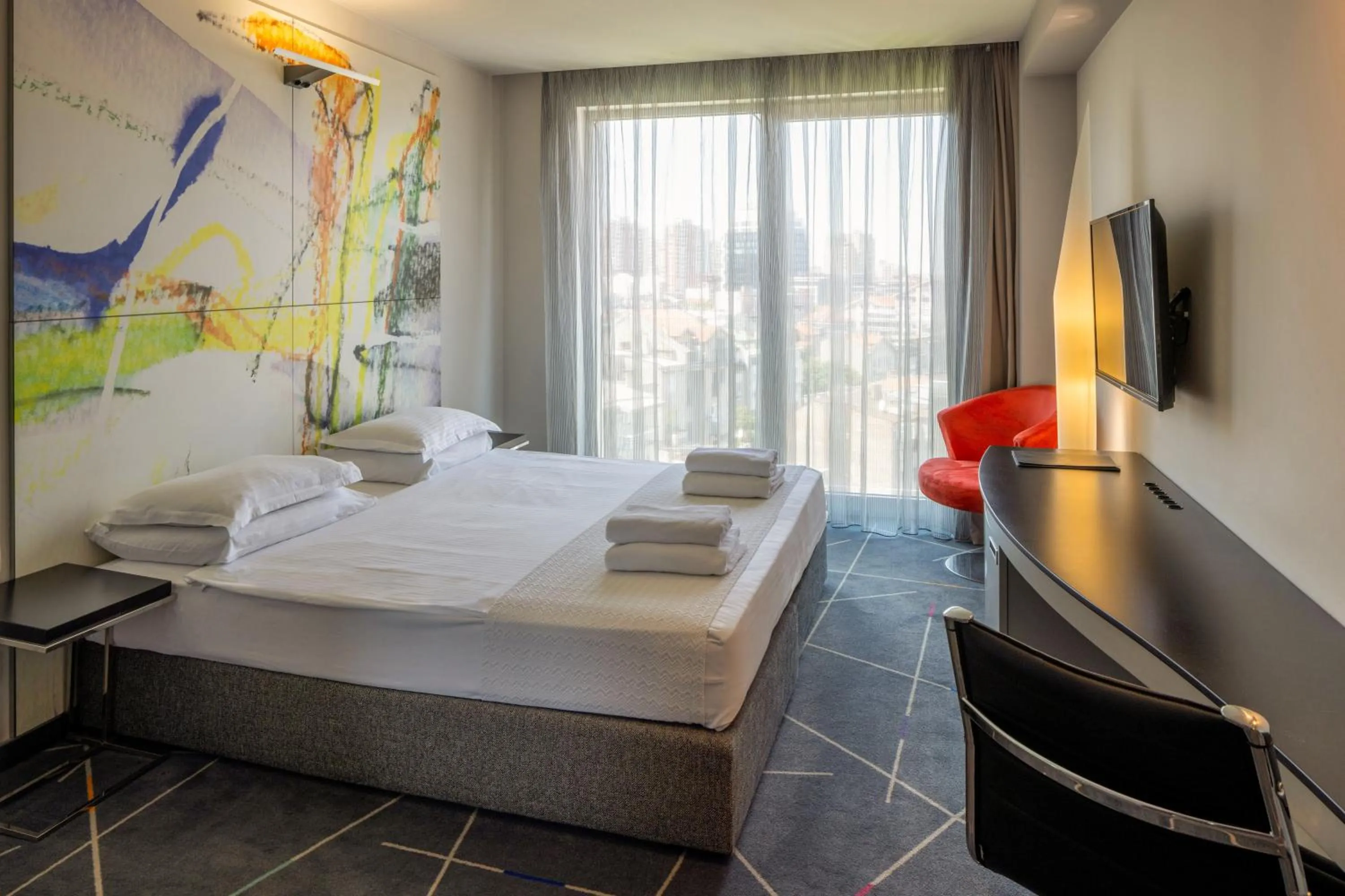 Bed in Nobel Zira Hotel