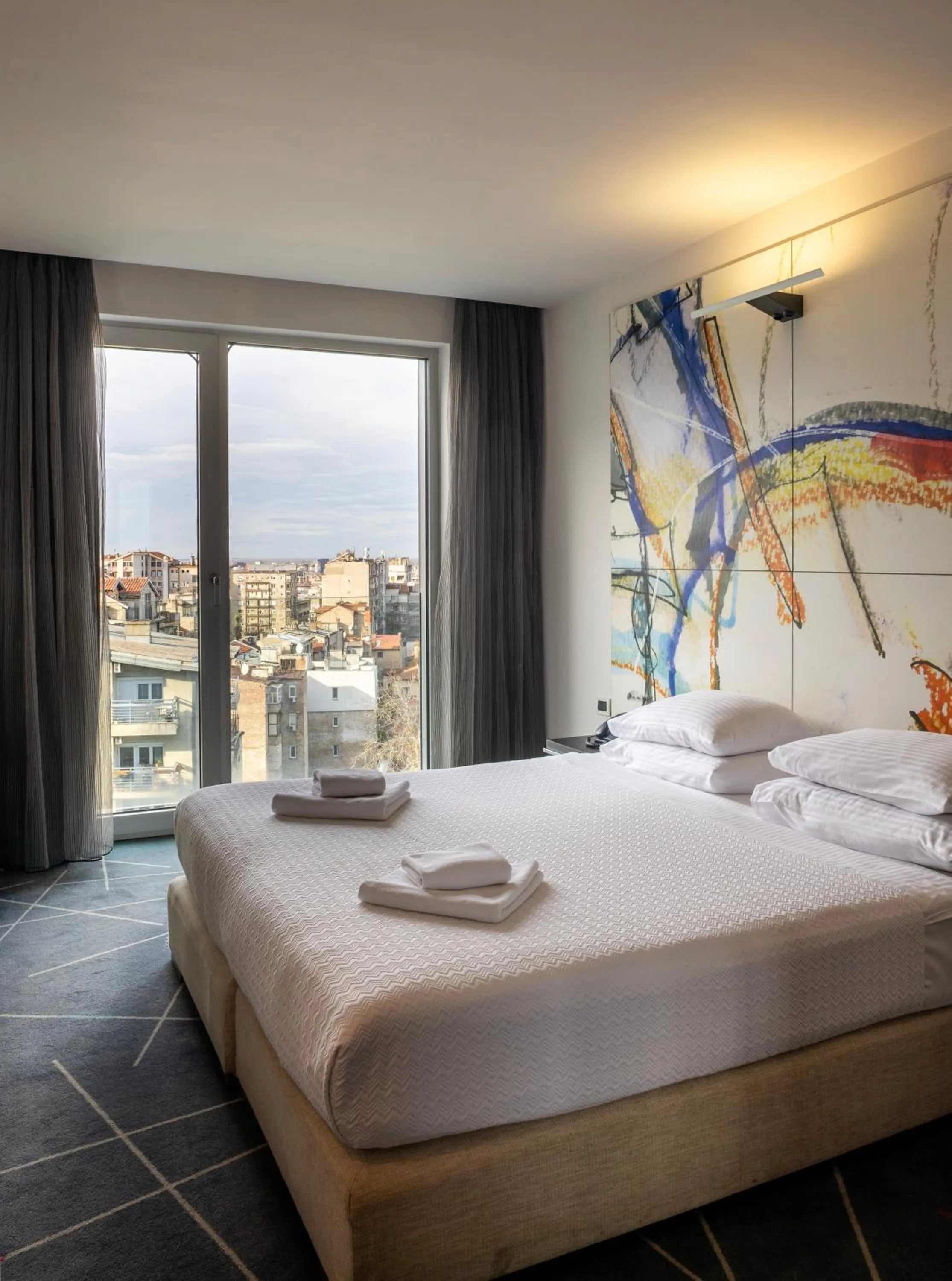 Bed in Nobel Zira Hotel