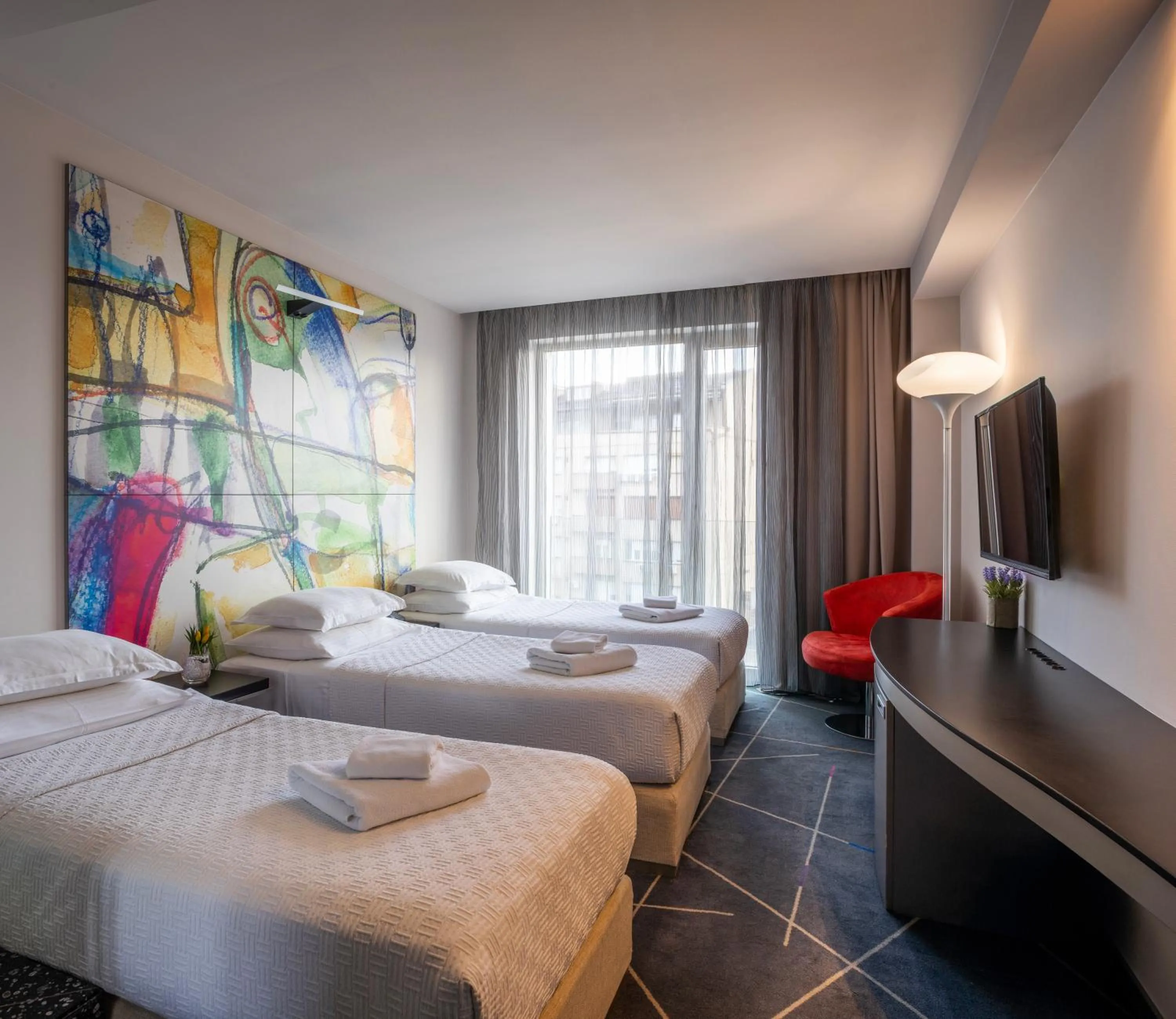 Bed in Nobel Zira Hotel