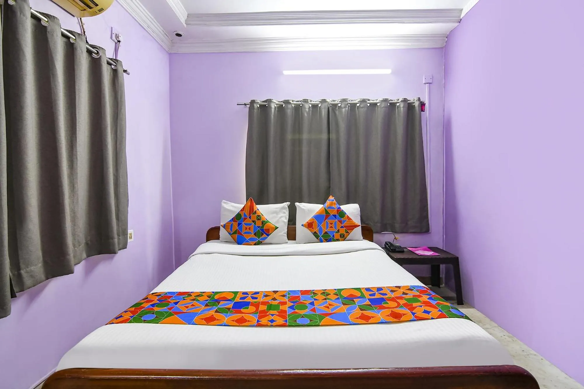 Bed in FabExpress Karunamoyee Regency