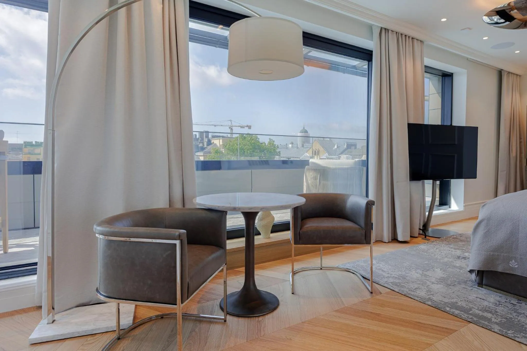 Seating area, Bed in Waldorf Astoria Helsinki