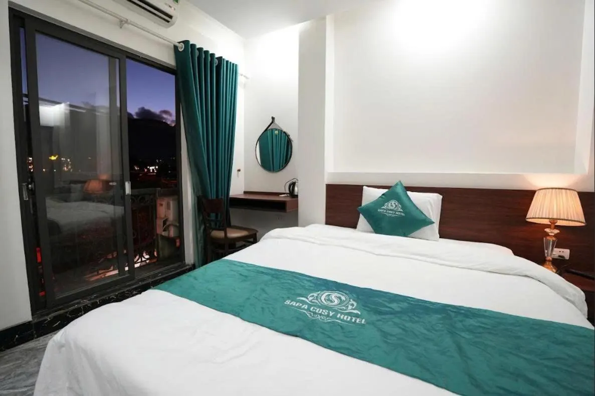 Bed in SAPA COSY HOTEL