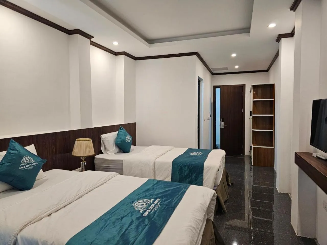 Photo of the whole room, Bed in SAPA COSY HOTEL