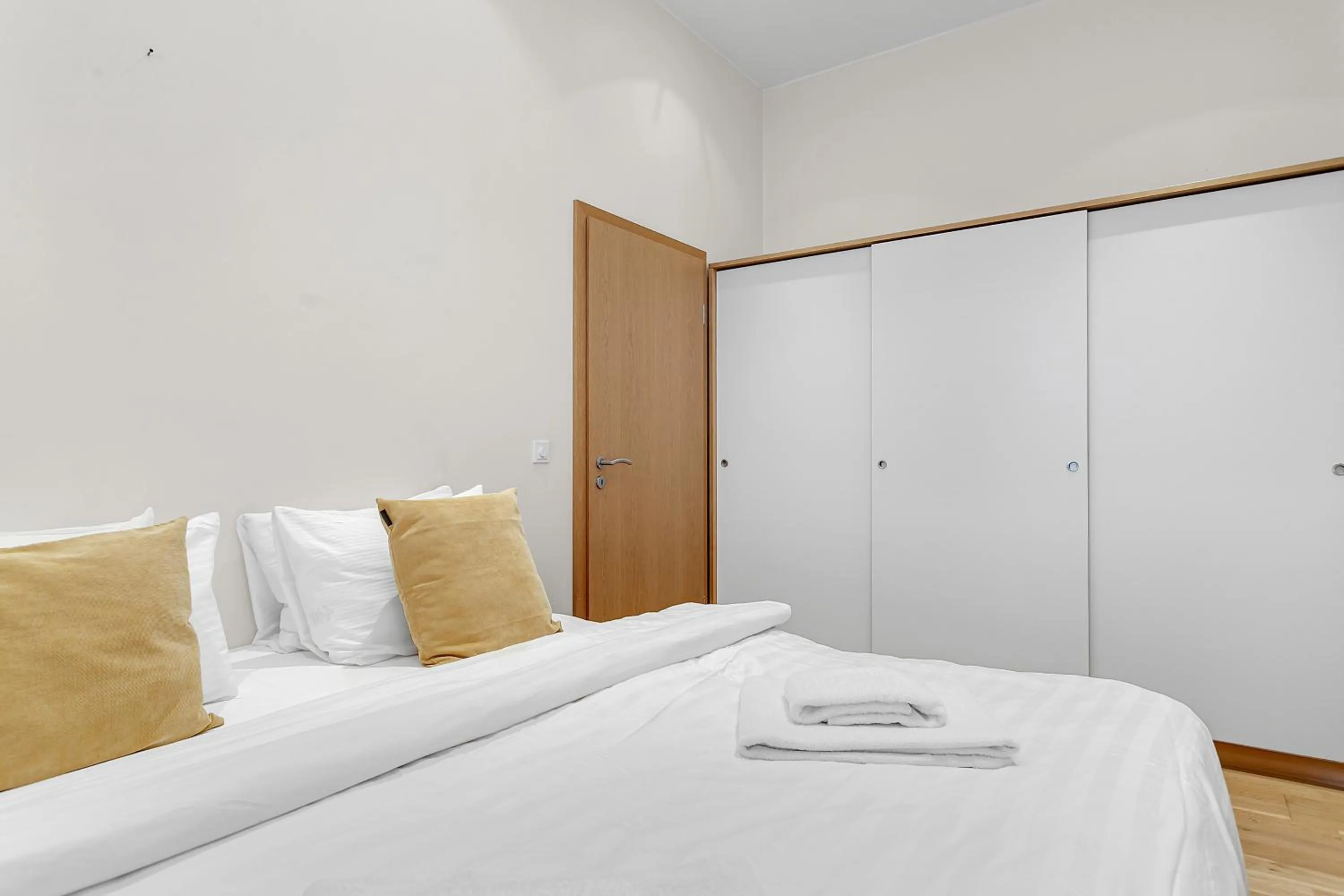 Bed in Máni Apartments